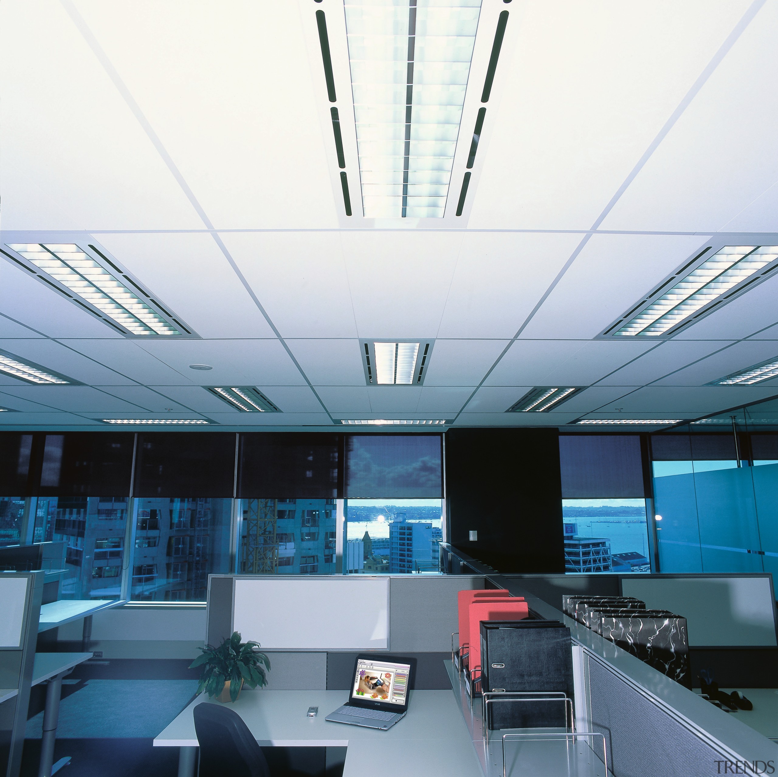 A view of a office with many lights. architecture, ceiling, conference hall, daylighting, glass, interior design, office, white