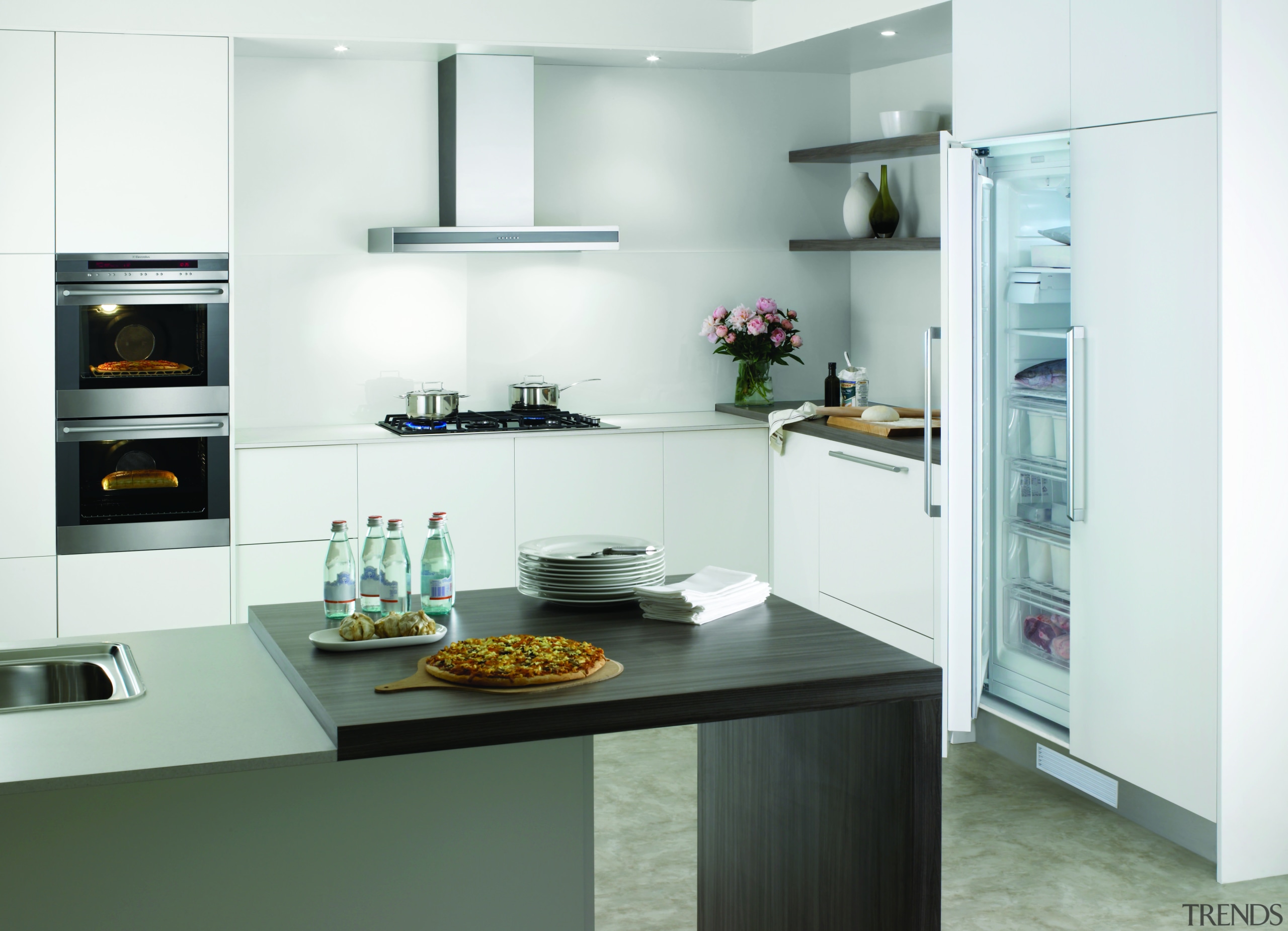 View of a kitchen which features a refrigerator cabinetry, countertop, cuisine classique, home appliance, interior design, kitchen, kitchen appliance, product design, white