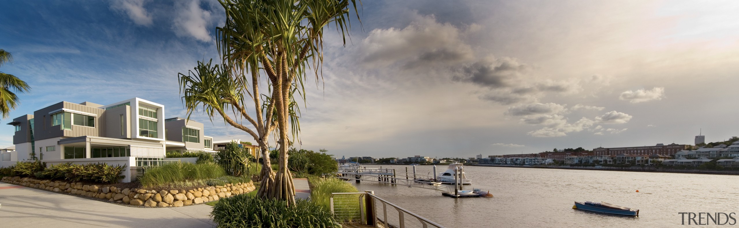 Images of the interior and exterior of Brisbanes condominium, home, mixed use, neighbourhood, property, real estate, residential area, sky, suburb, waterway, gray