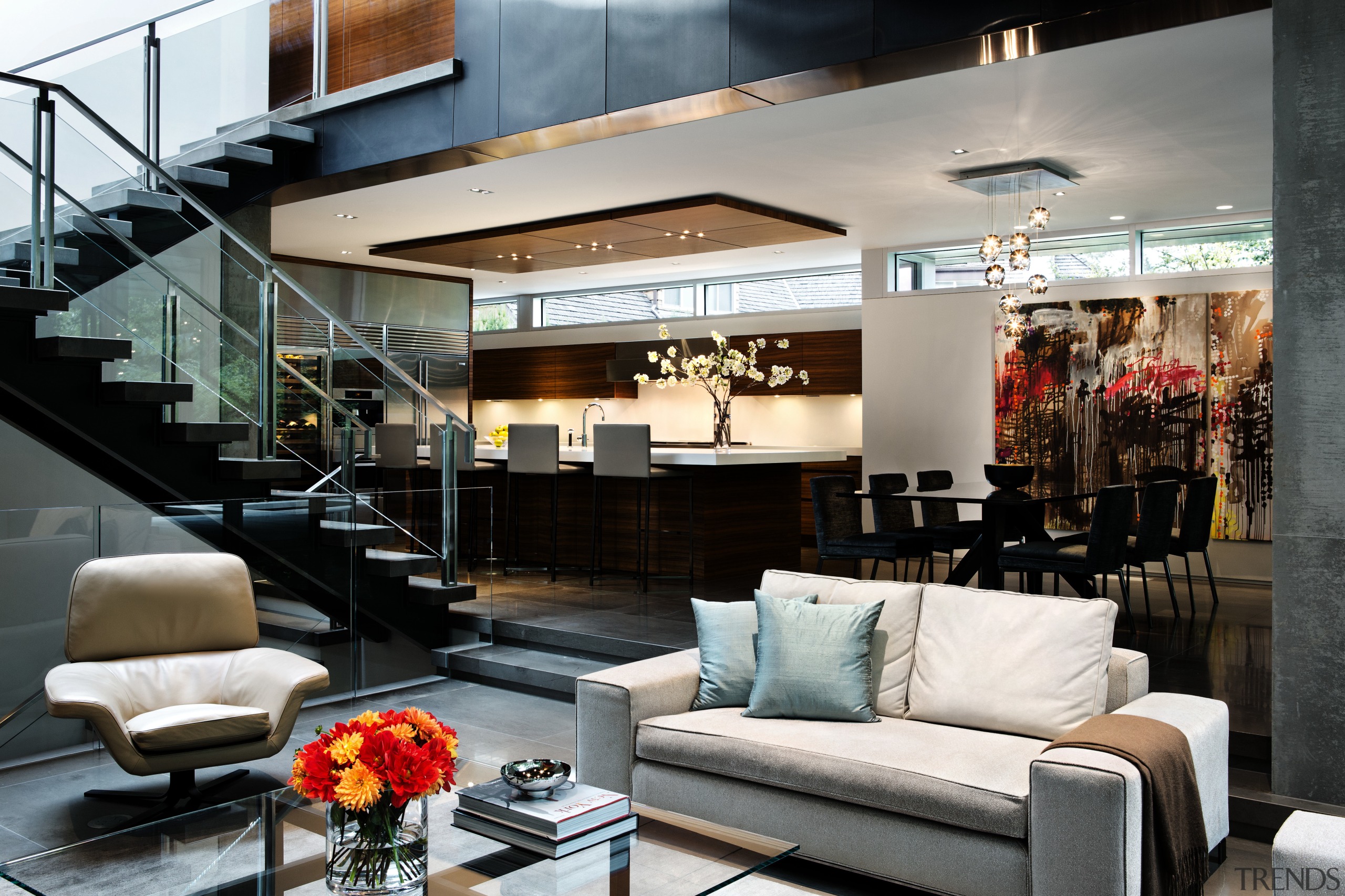 Although these interiors present as one large open interior design, living room, loft, black, gray