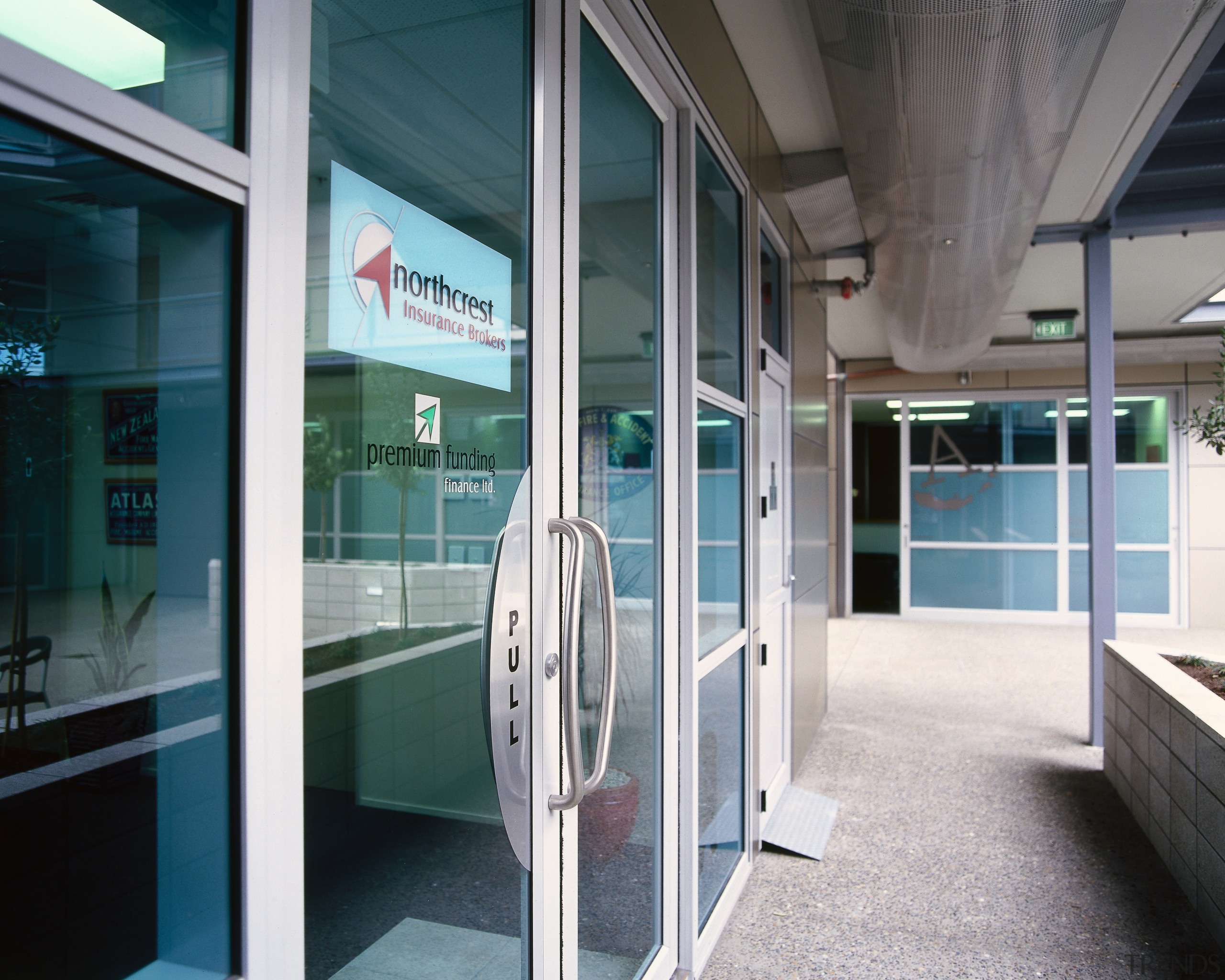 A view of the Jalcon homes building. - door, glass, window, gray, black