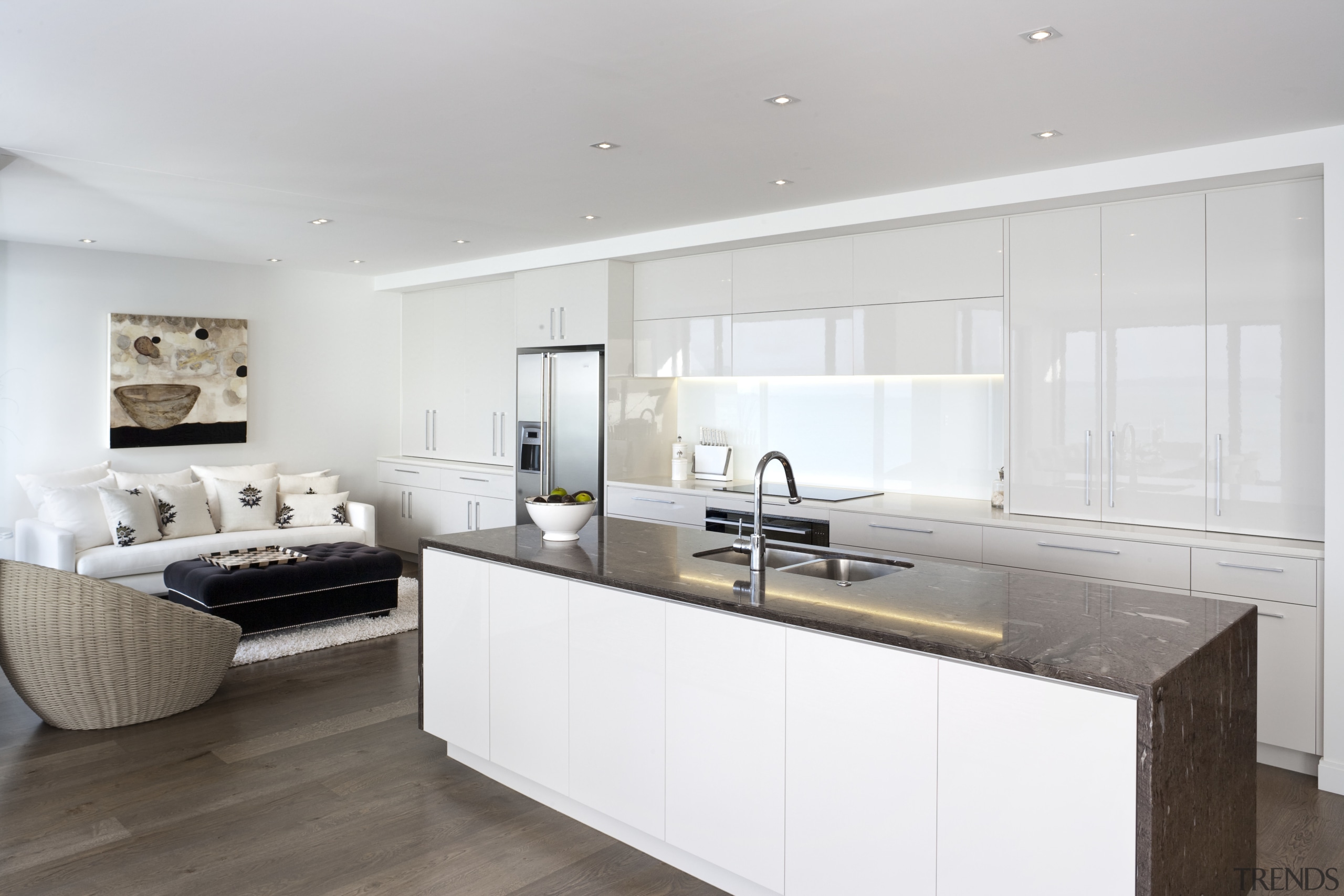 View of kitchen area which features island, granite countertop, cuisine classique, floor, interior design, kitchen, property, real estate, room, white, gray