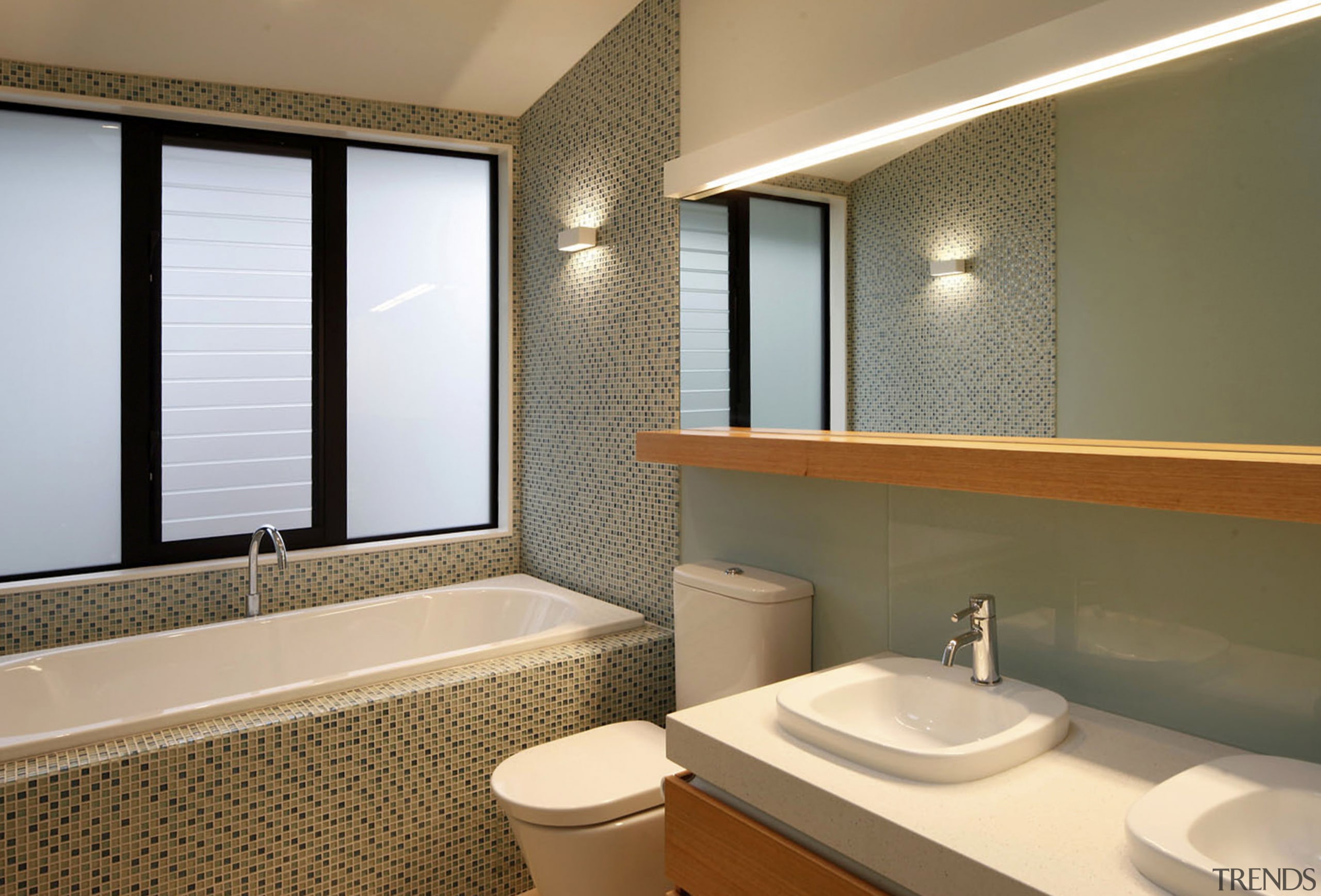 Bathroom with tile mosaic wall and green splashback. bathroom, home, interior design, real estate, room, brown