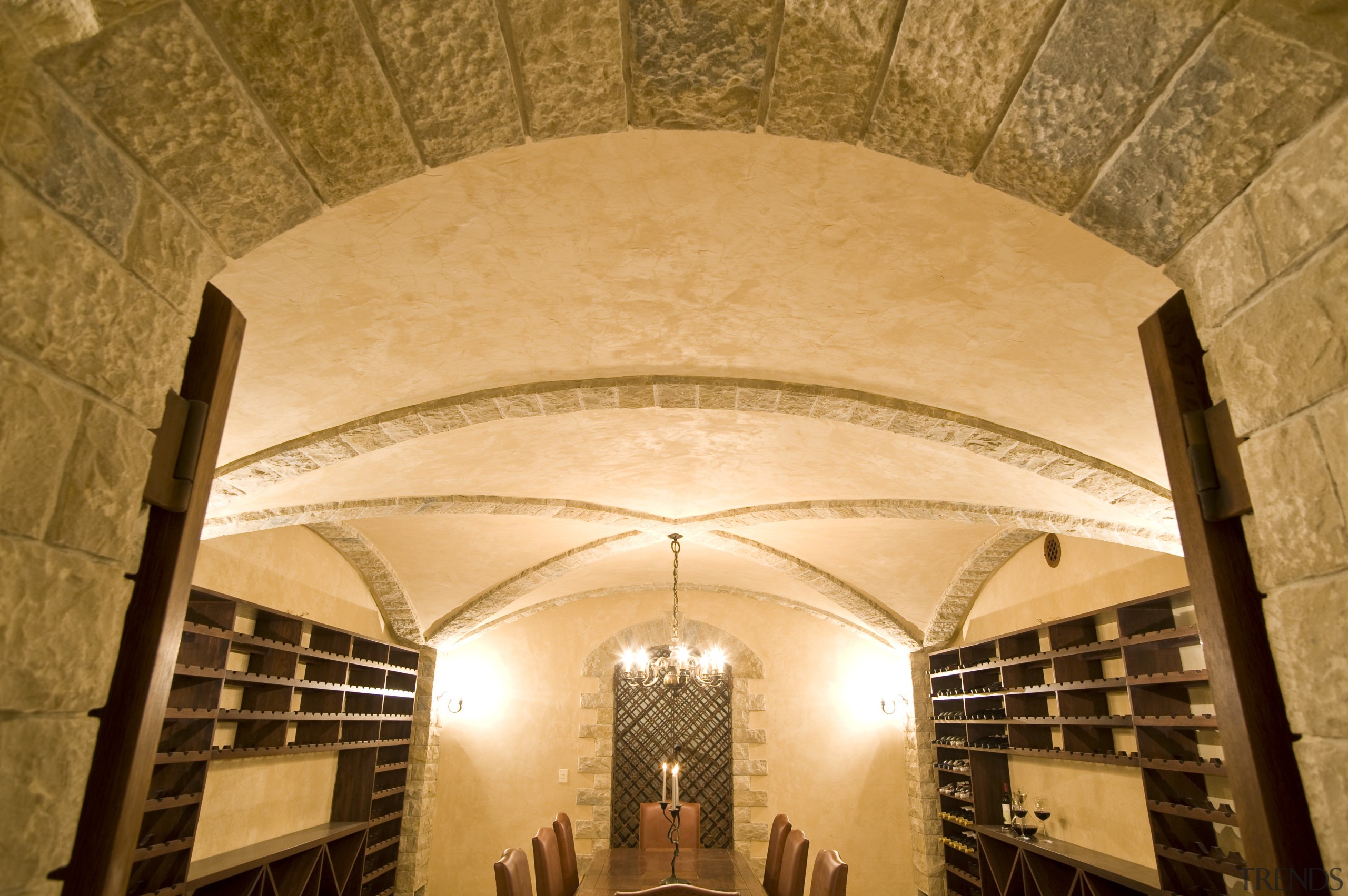 View of a wine cellar which features limestone arcade, arch, architecture, ceiling, crypt, daylighting, estate, interior design, symmetry, orange, brown