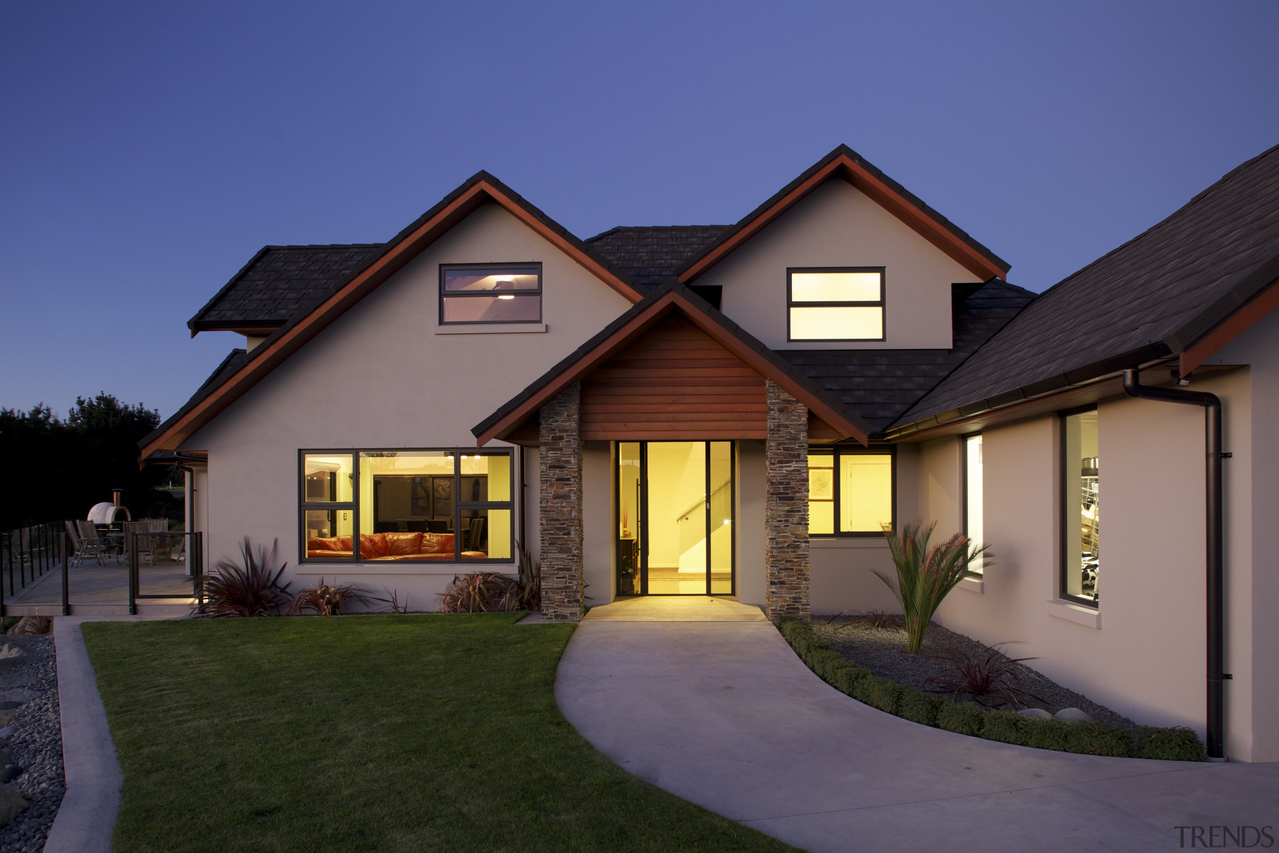 Design and build by Fowler Homes Taranaki - building, cottage, elevation, estate, facade, home, house, lighting, property, real estate, residential area, roof, siding, sky, window, blue