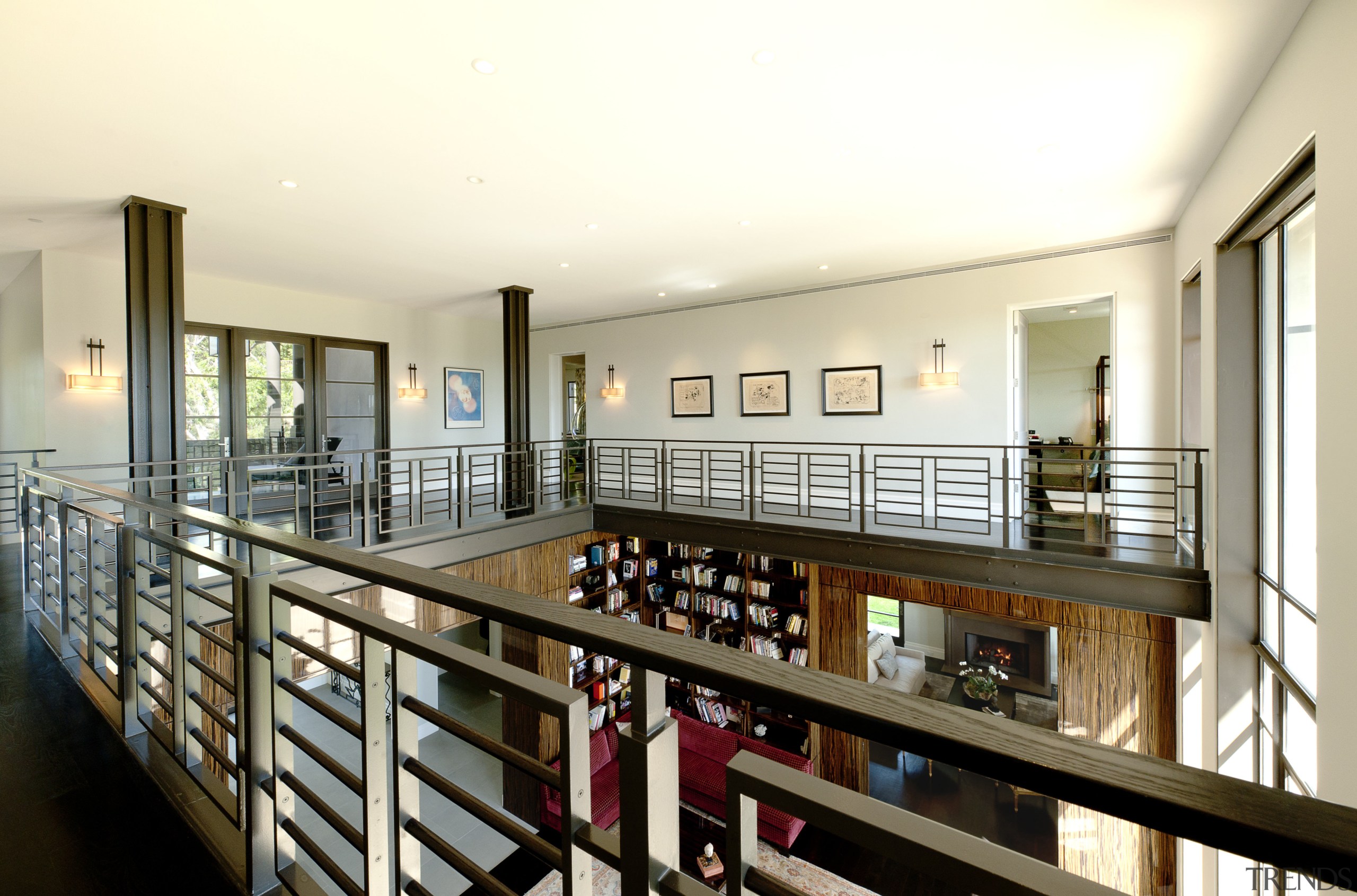 View of the library that features shelving and apartment, interior design, real estate, yellow