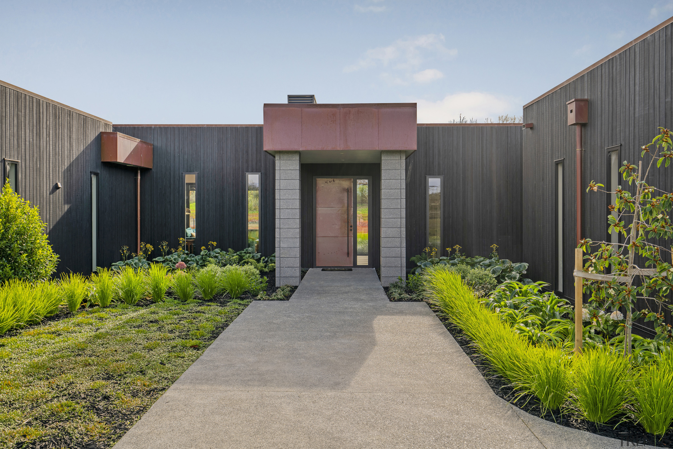 A strong entrance form with copper clad door 