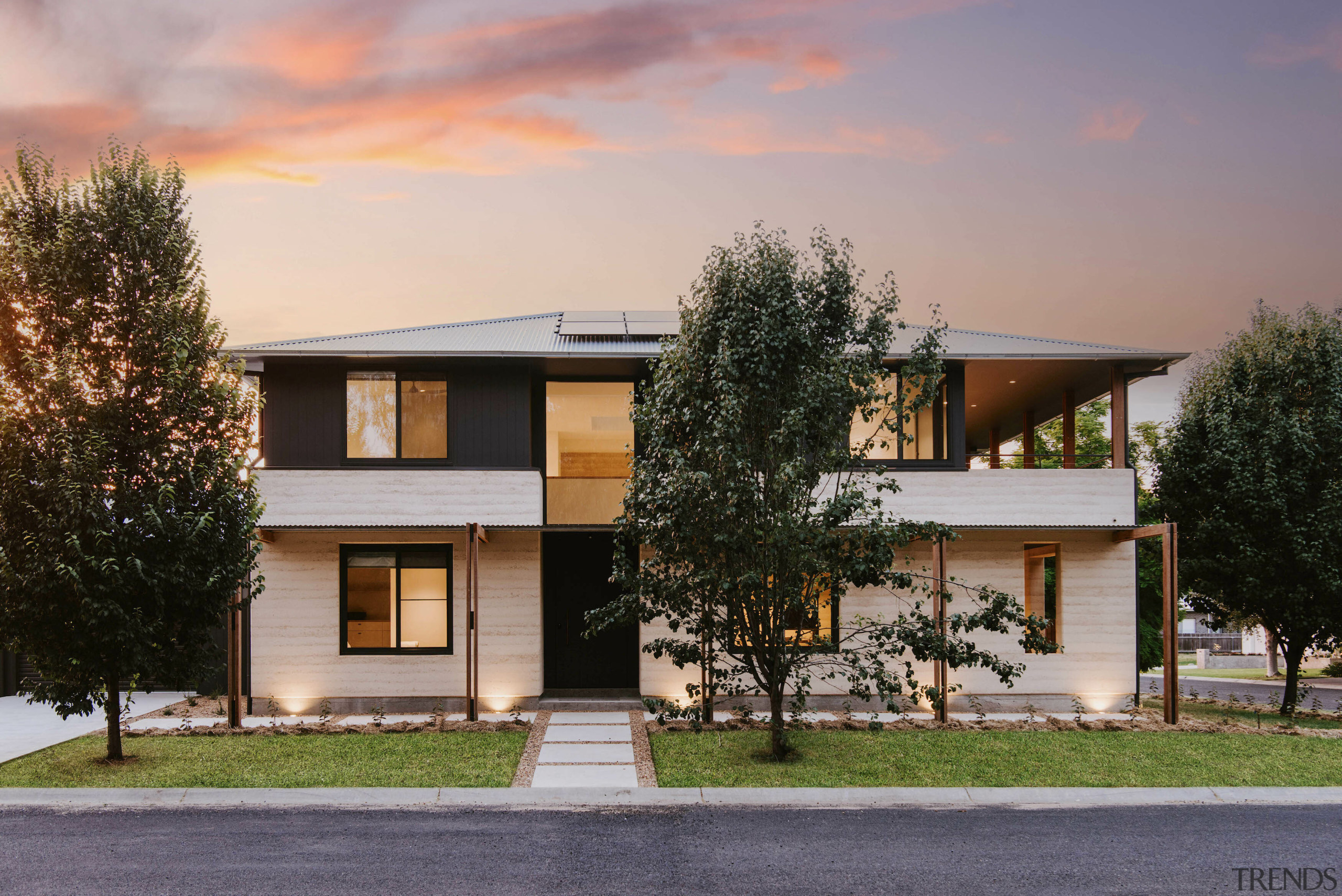 The home's heavy rammed earth walls provide a 