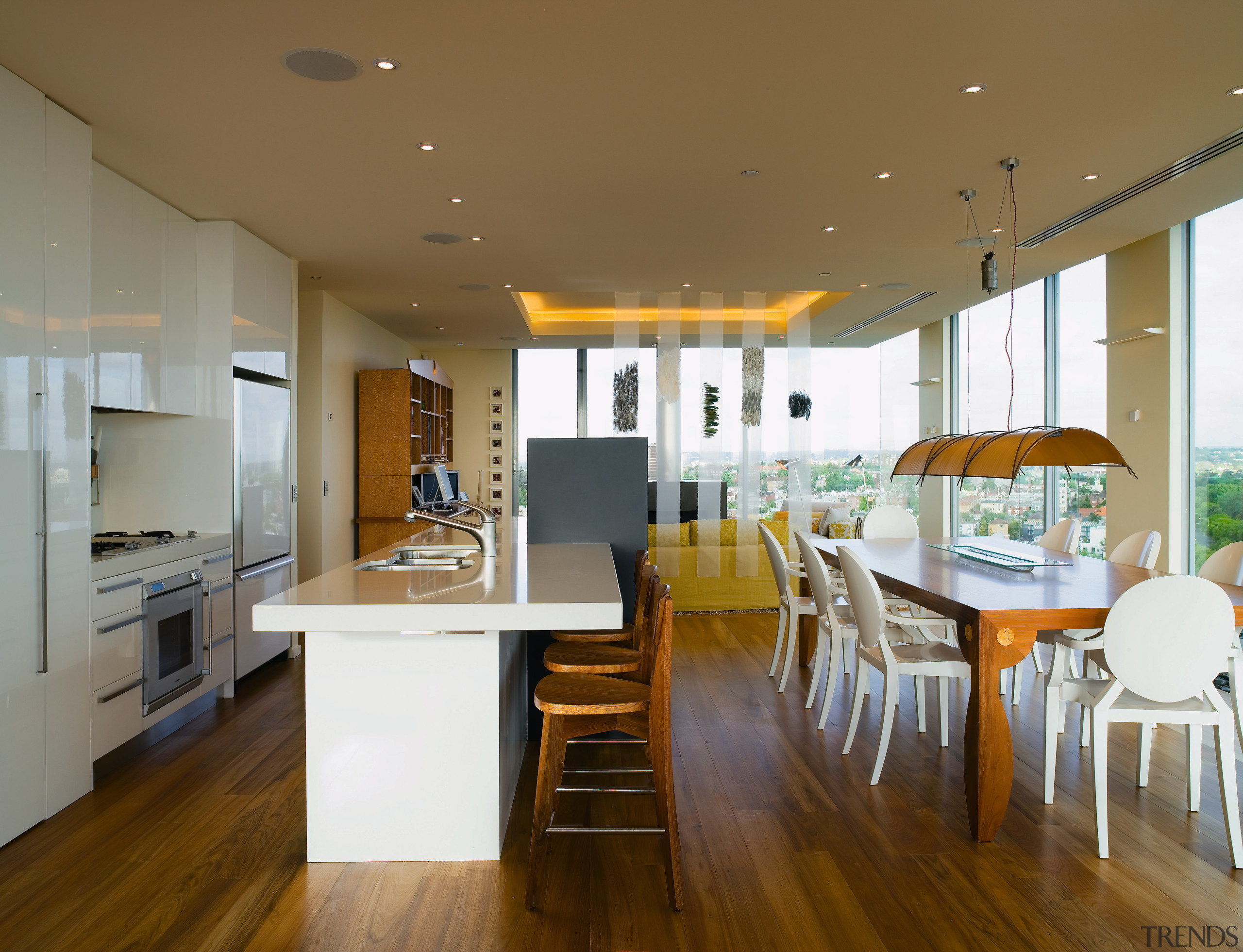 A view of the kitchen and dining area ceiling, countertop, floor, flooring, house, interior design, kitchen, real estate, room, wood flooring, brown