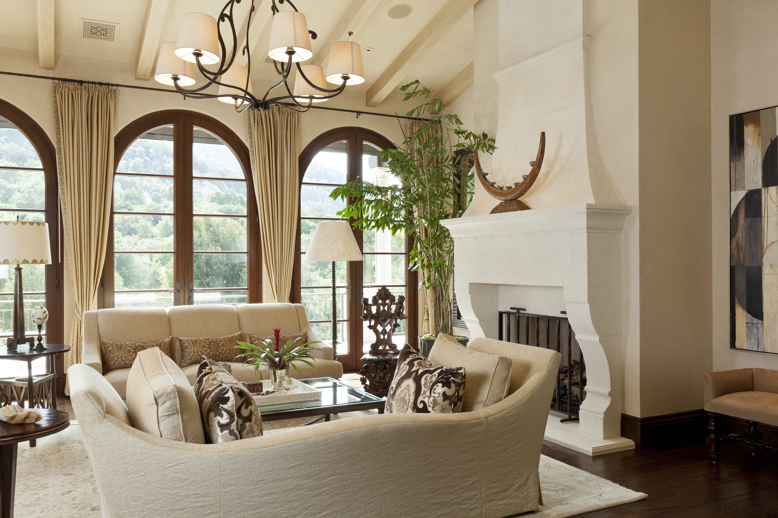 The Mediterranean-comes-to-California style in this home includes simplified ceiling, estate, home, interior design, living room, room, window, brown, gray