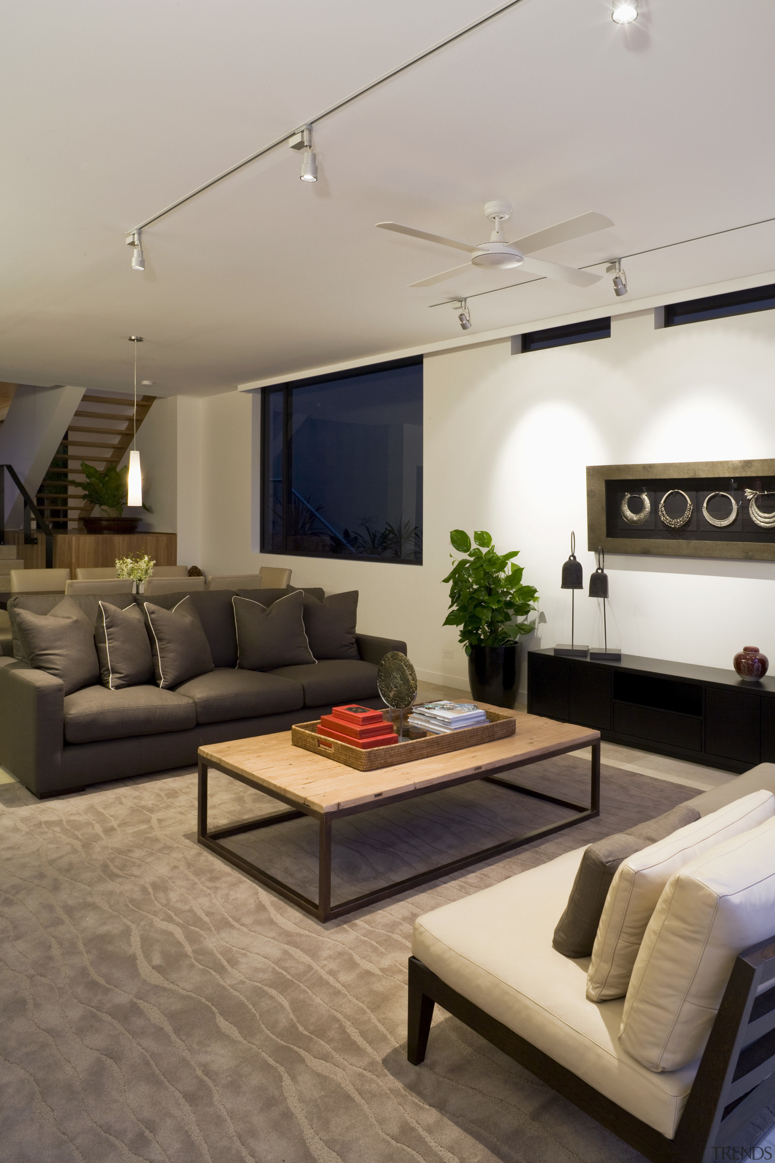 View of the Norman Reach development which is ceiling, floor, flooring, furniture, interior design, living room, room, gray, brown