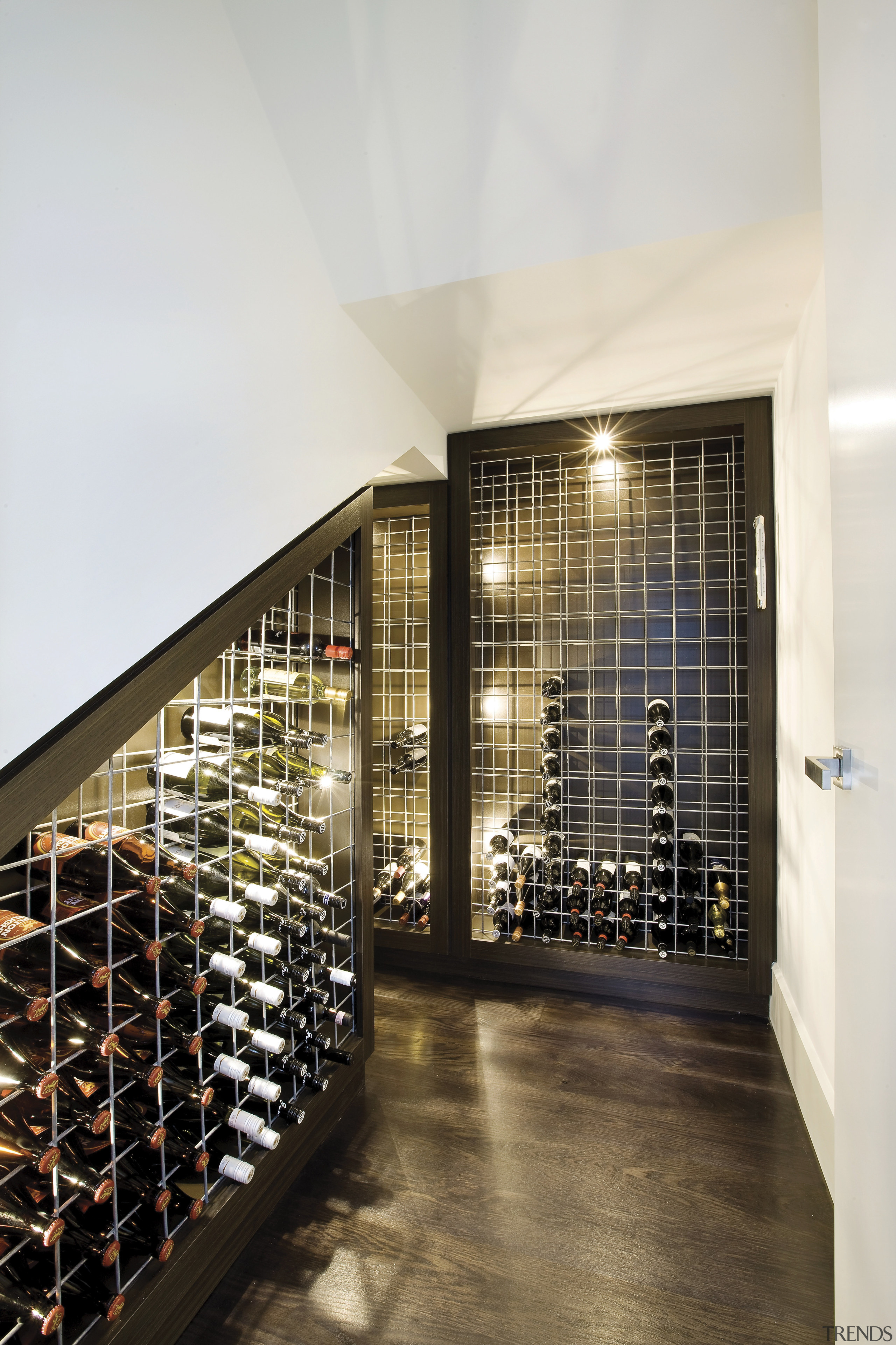 View of a wine cellar with concrete floor glass, interior design, wine cellar, winery, white, brown