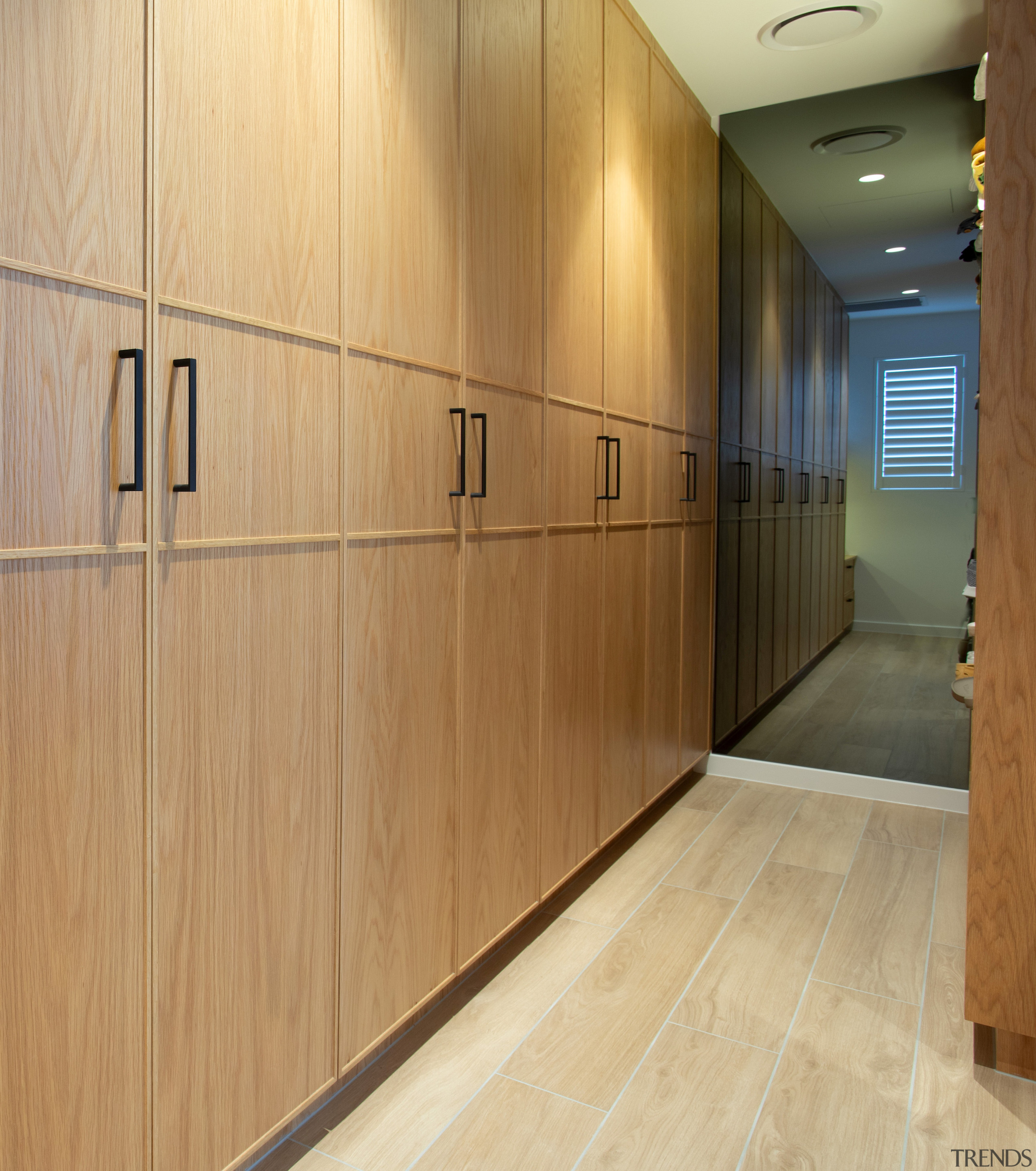 Slimline shaker profile cabinetry in the walk-in wardrobe 