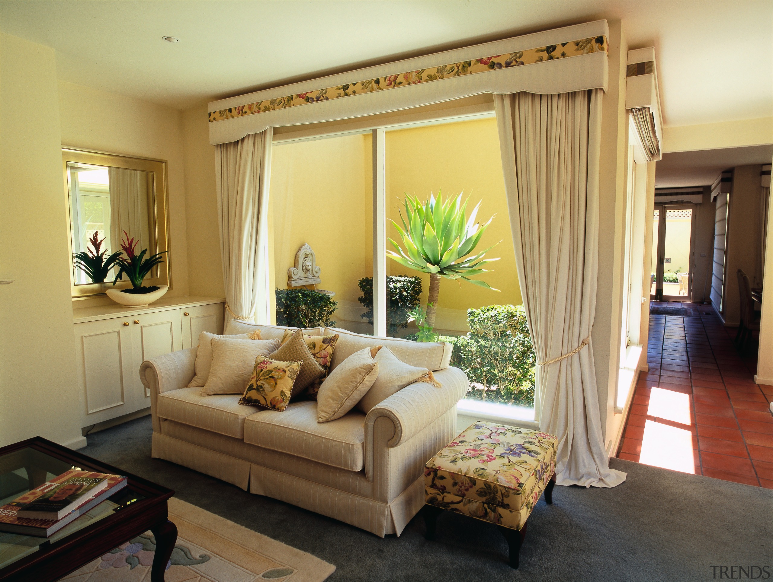 View of the living area, cream coloured sofa, ceiling, curtain, home, interior design, living room, real estate, room, window, window covering, window treatment, orange, brown