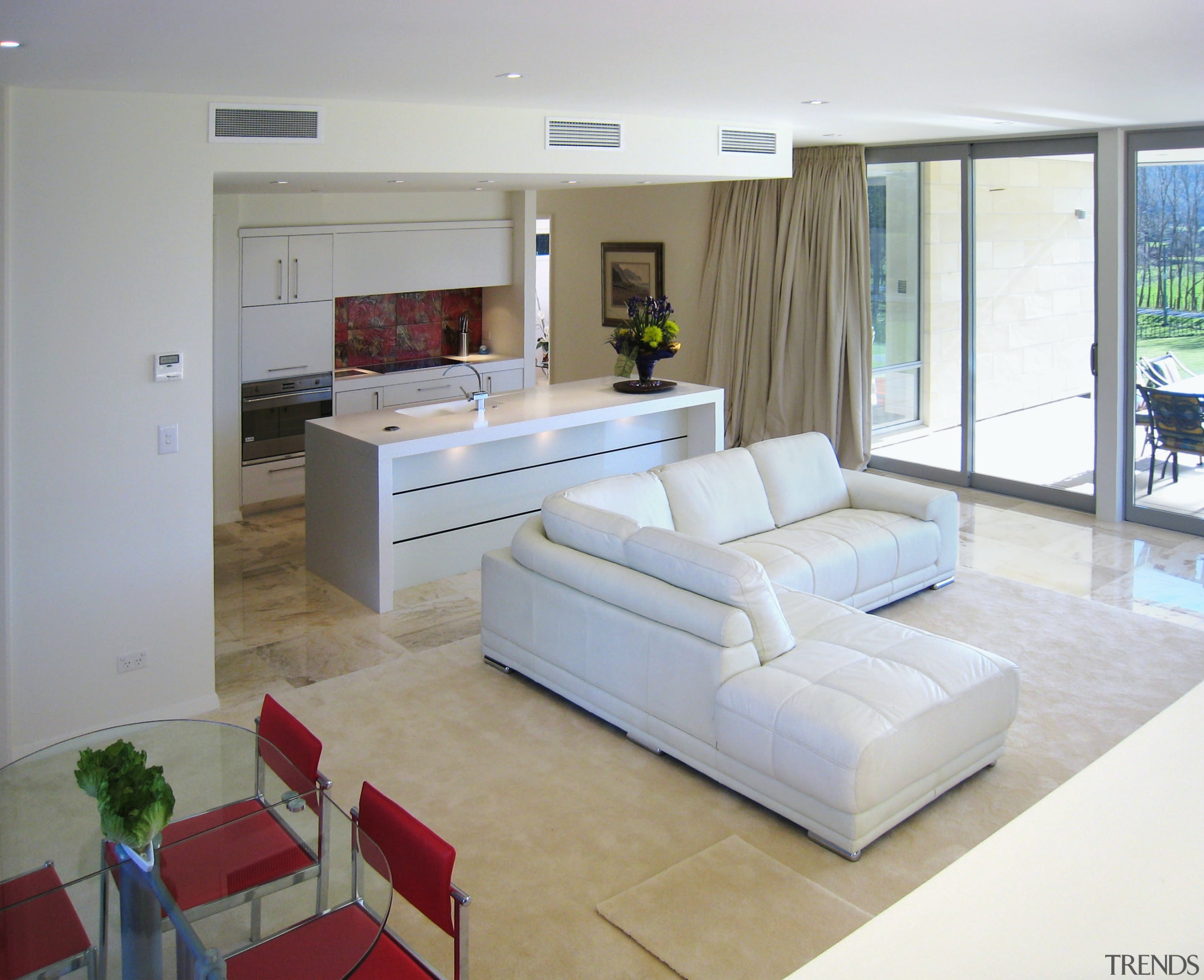 Living area featuring polished marble flooring inside home floor, flooring, house, interior design, living room, property, real estate, gray