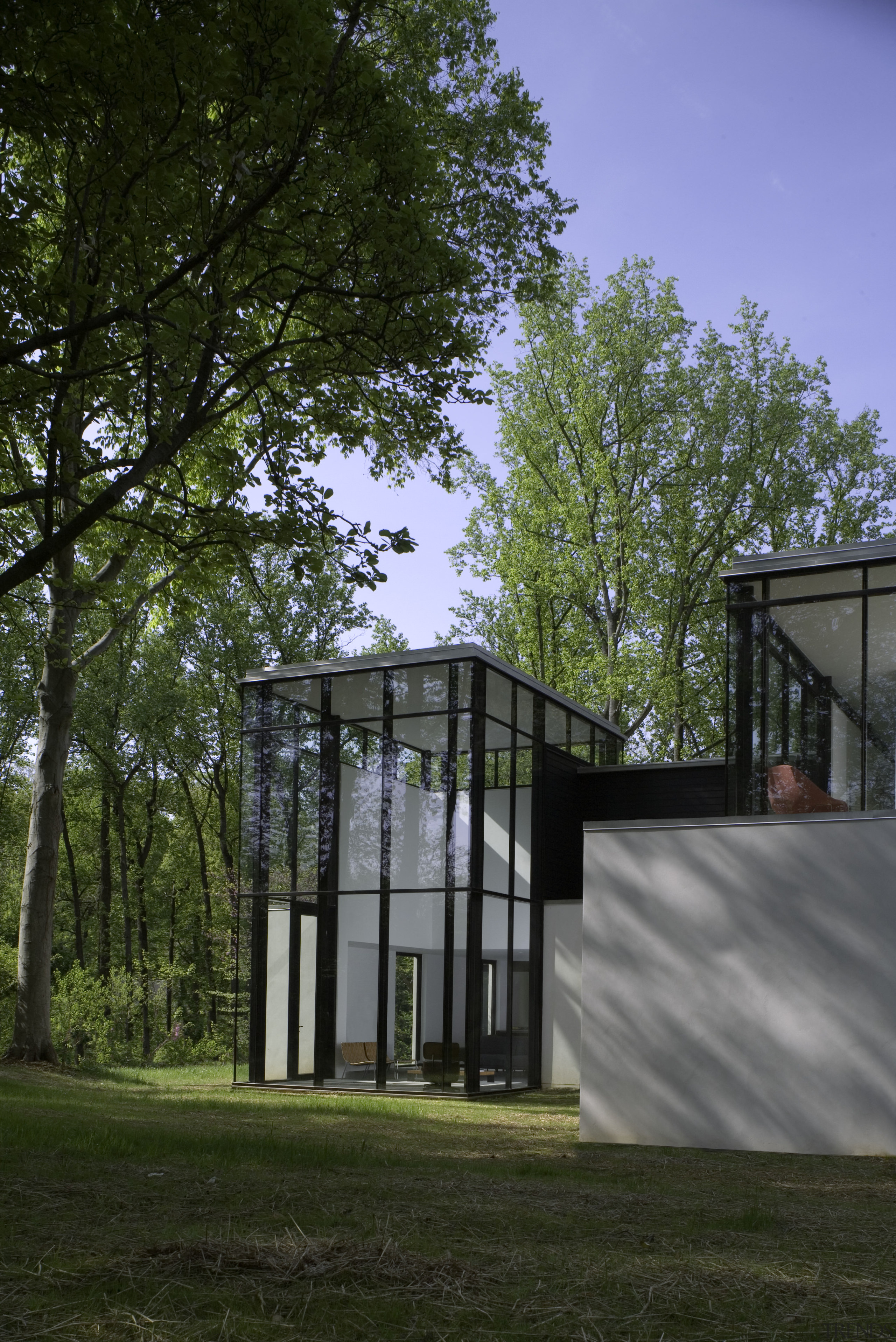 White walls and dark furniture and floors provide architecture, building, facade, grass, home, house, residential area, tree, brown