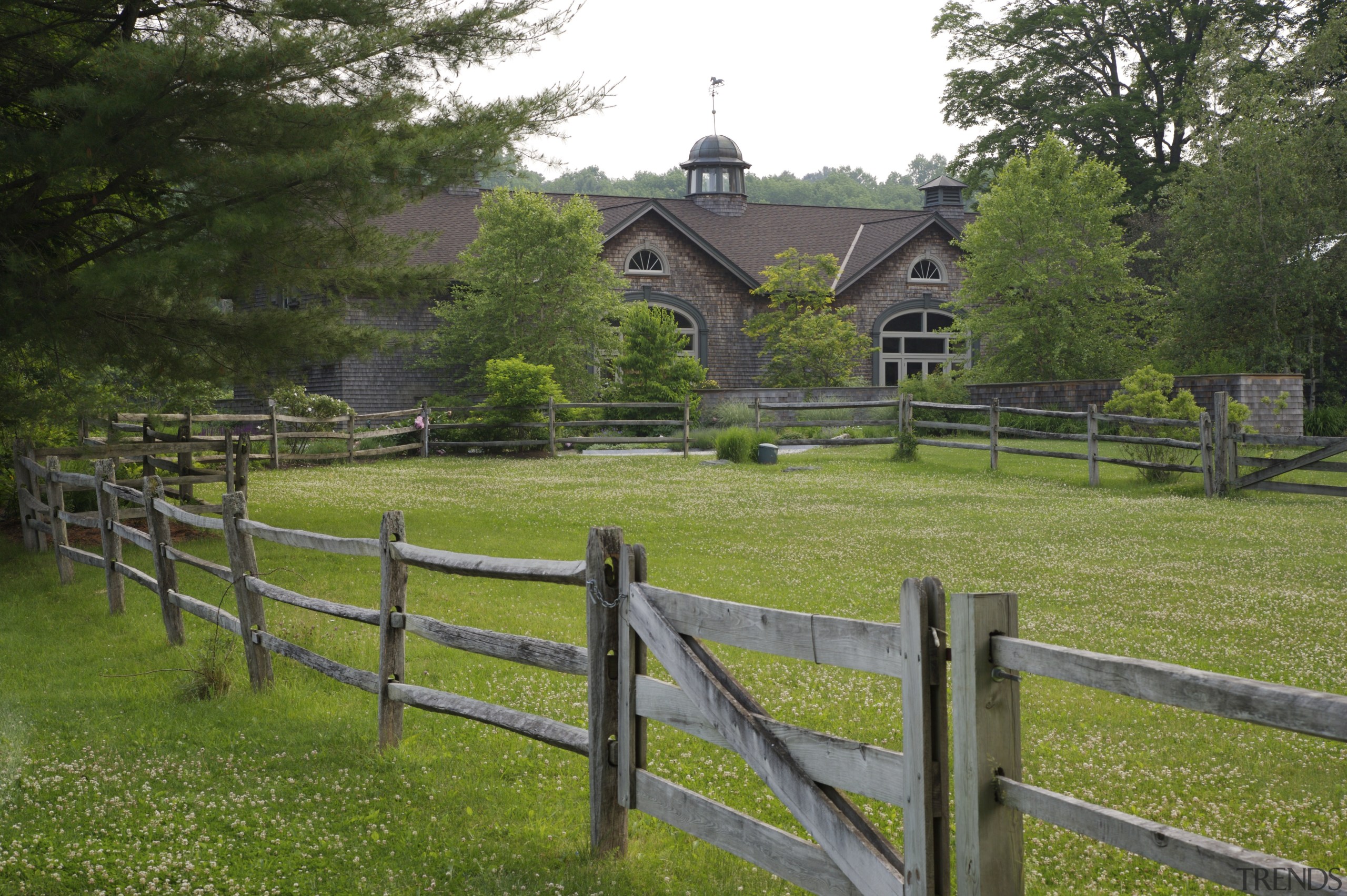 Exterior view of the house also showing the cottage, estate, farm, fence, grass, grassland, home, house, land lot, landscape, meadow, nature reserve, outdoor structure, pasture, path, property, real estate, rural area, split rail fence, tree, brown