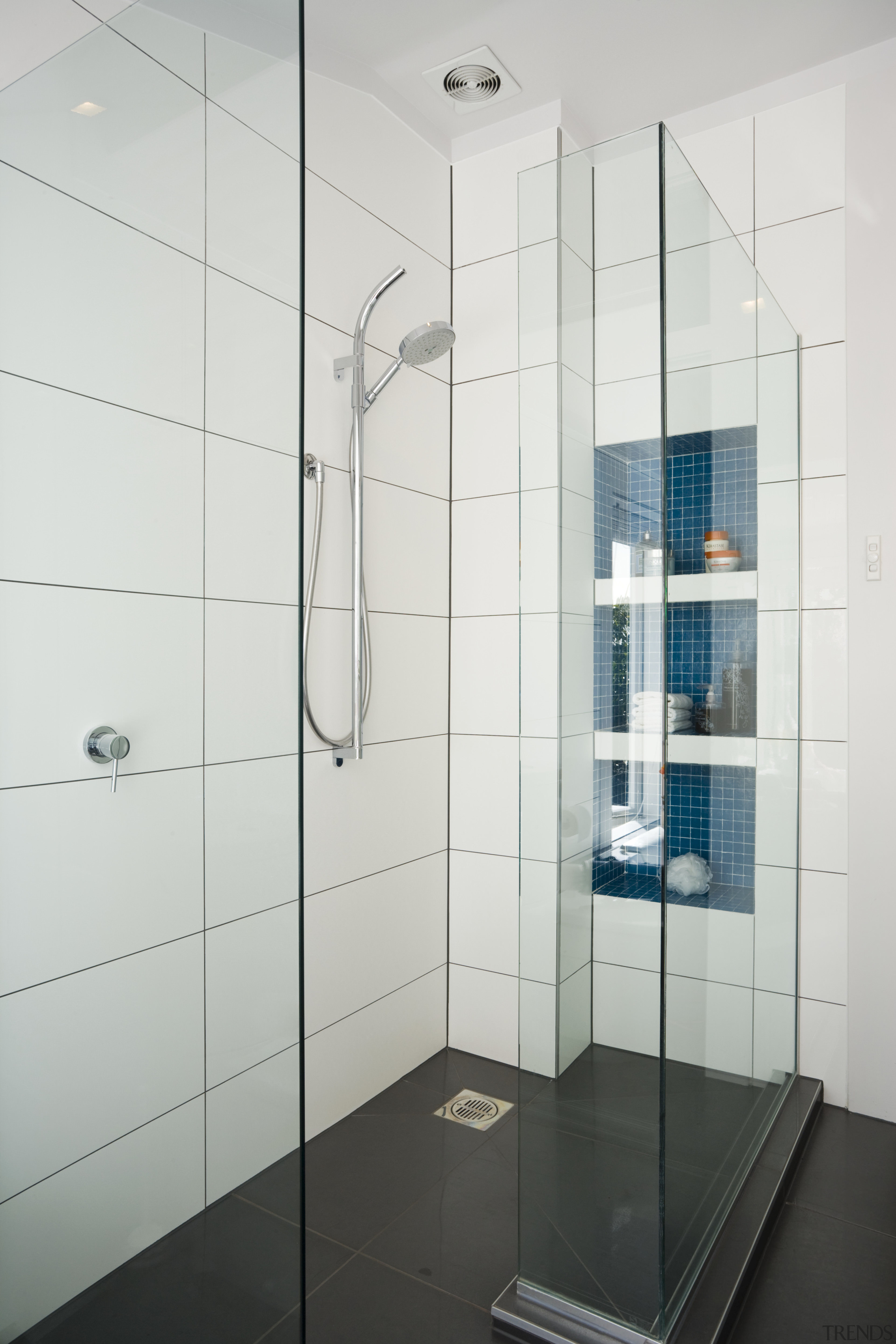 Image of the Shower enclosure showing the Shower angle, bathroom, floor, glass, plumbing fixture, product design, shower, tile, white