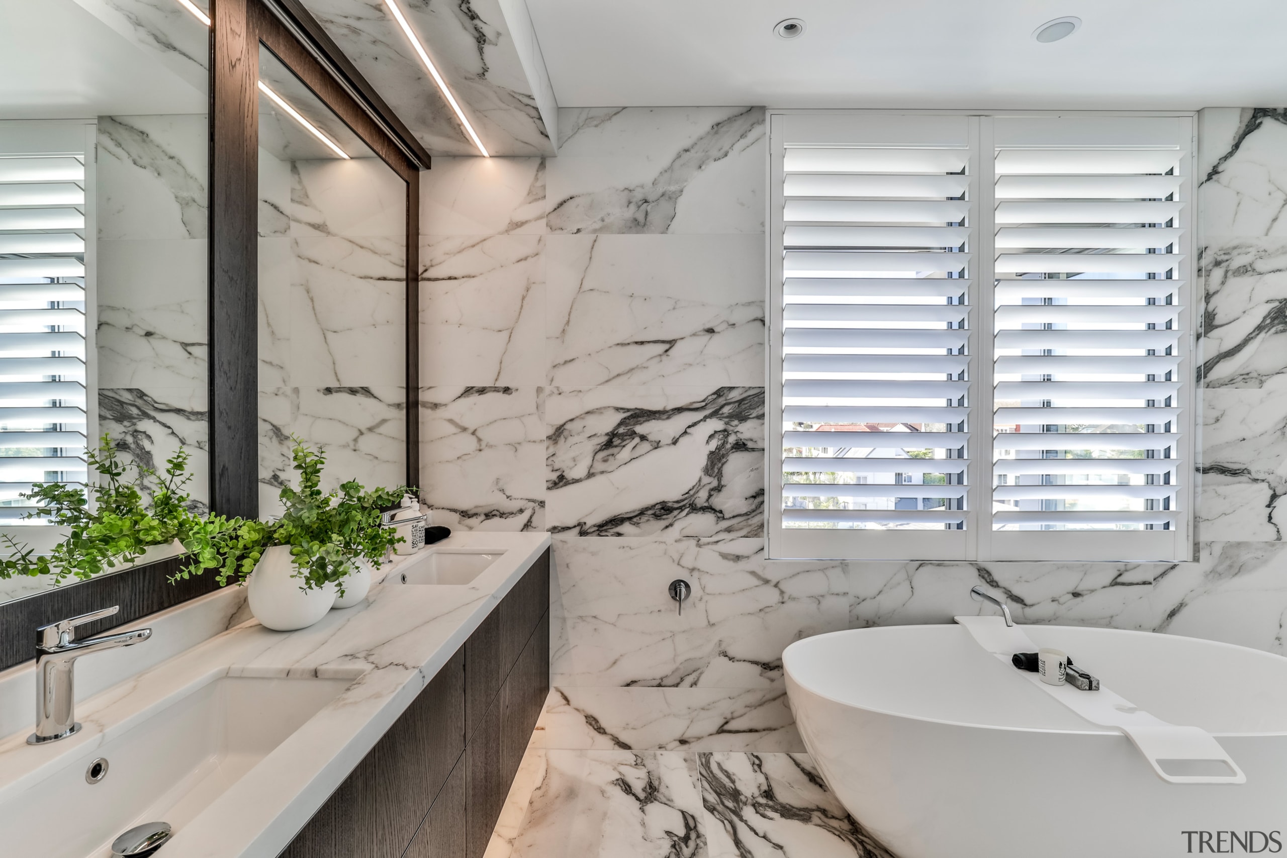 Strip lighting above the vanity is intended to 