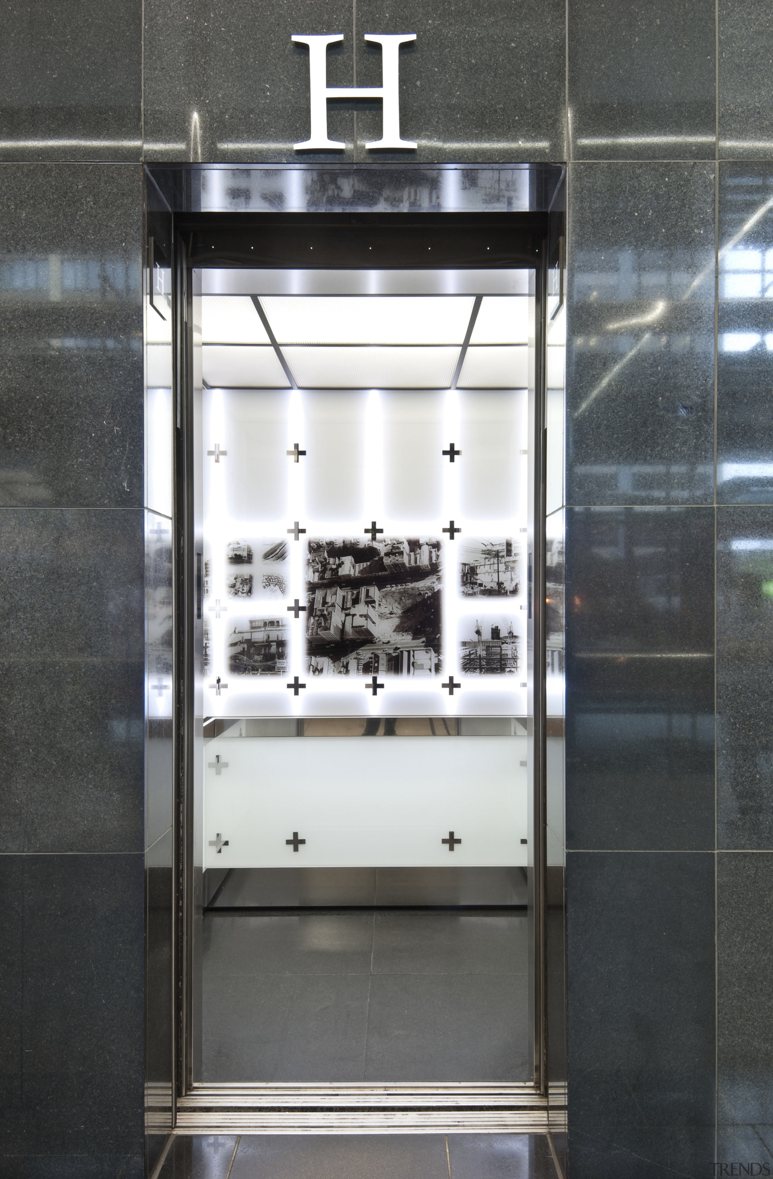 View of a Compass destination entry system from display case, glass, black, gray