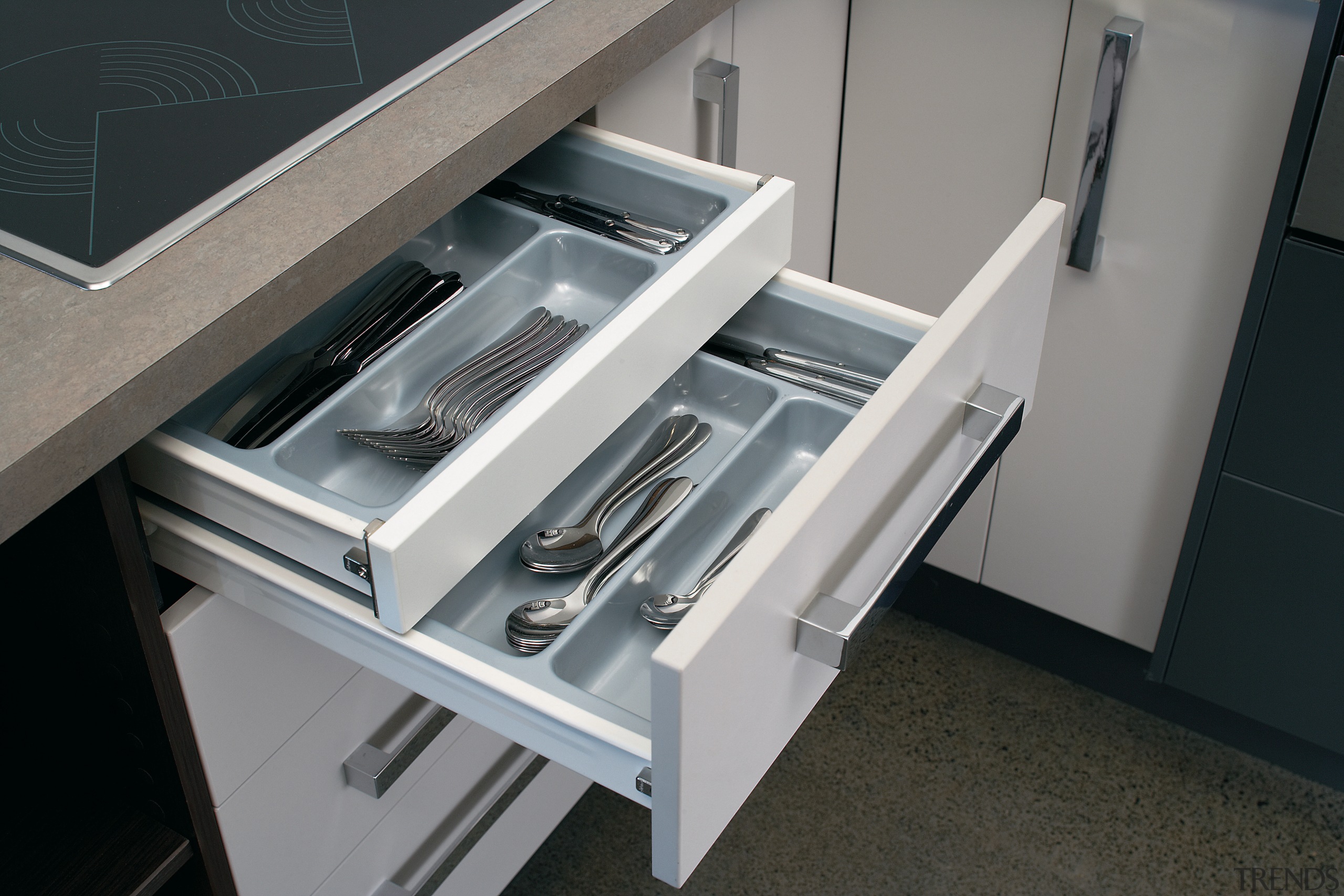 view of the kitchen cabinetry featuring pull out furniture, product, product design, gray, black