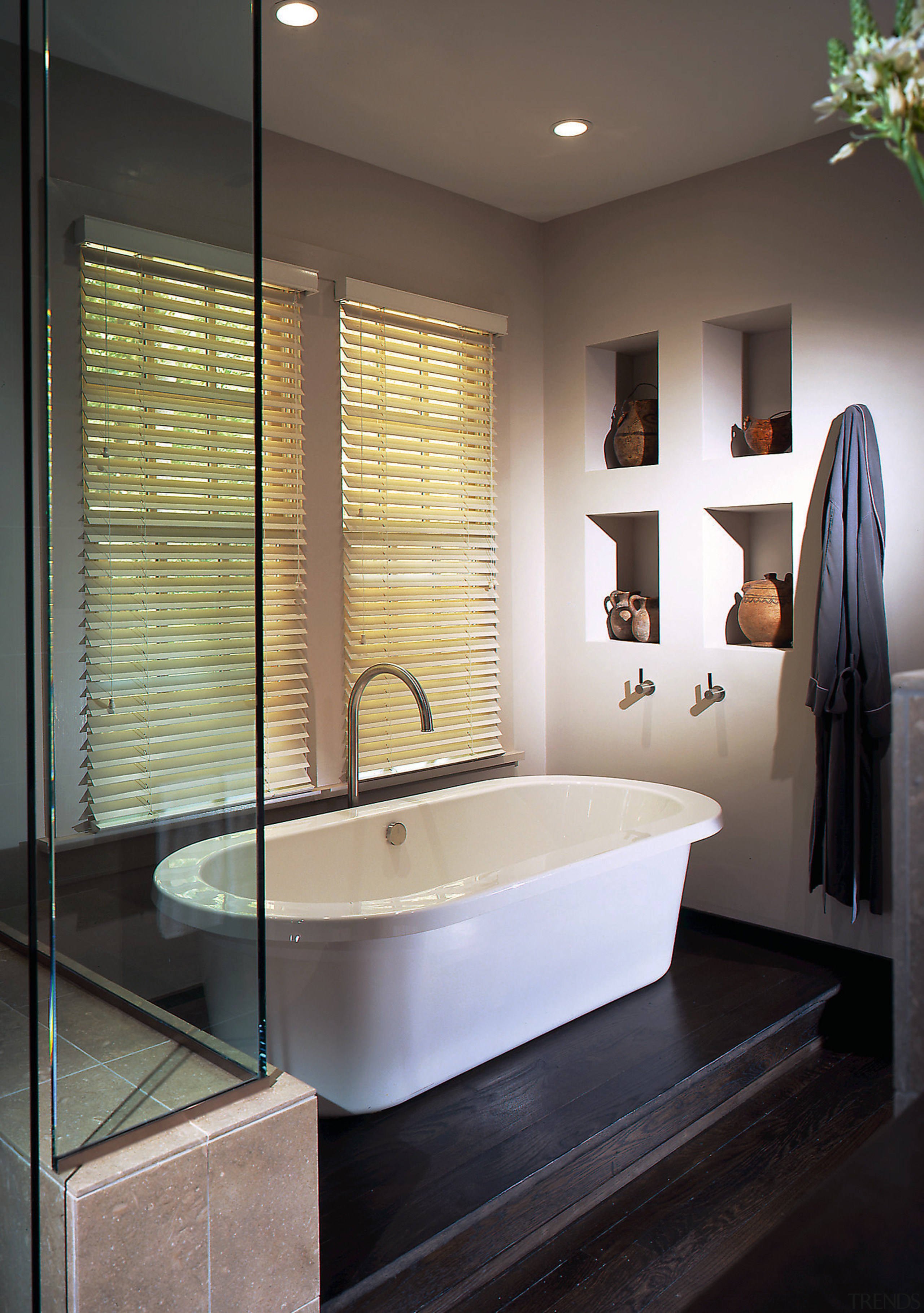 view of this bathroom featuring  dark stained bathroom, ceiling, floor, home, interior design, plumbing fixture, room, sink, window, black, gray