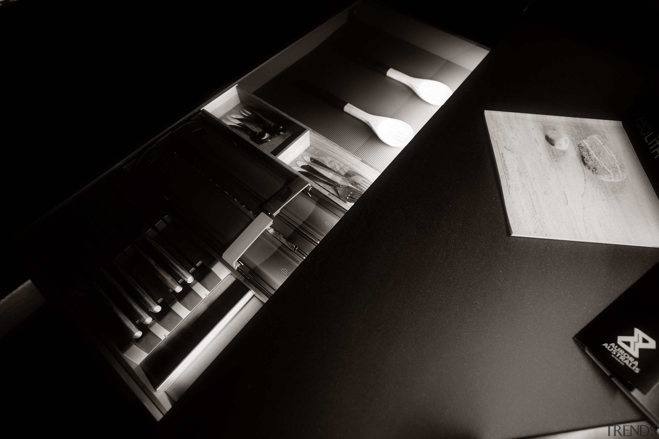 Customised, internally lit drawer interiors are both practical black and white, light, monochrome, monochrome photography, product design, black