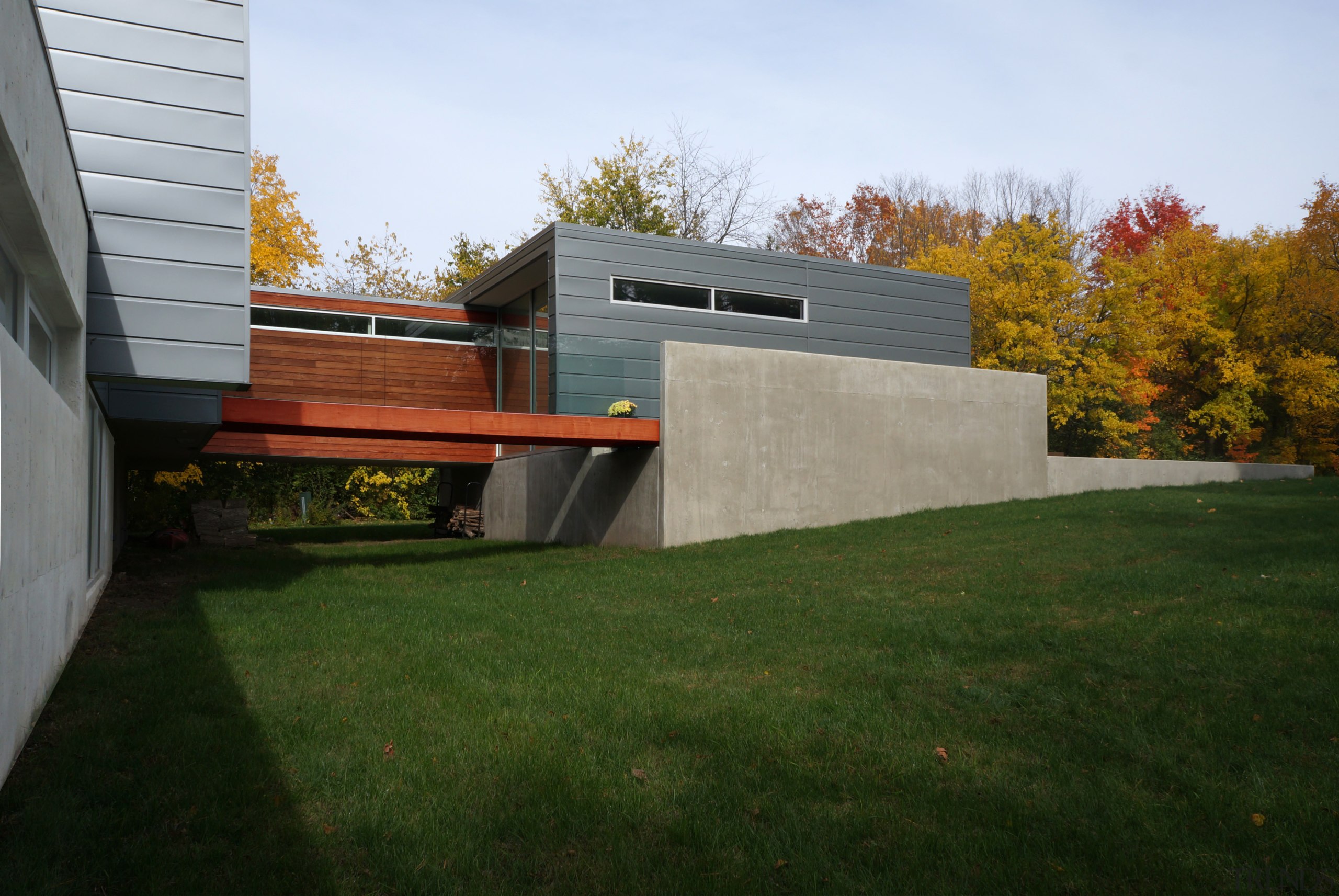 Slender windows on the garage and internal entranceway architecture, backyard, facade, grass, home, house, lawn, property, real estate, residential area, roof, siding, wall, yard, brown