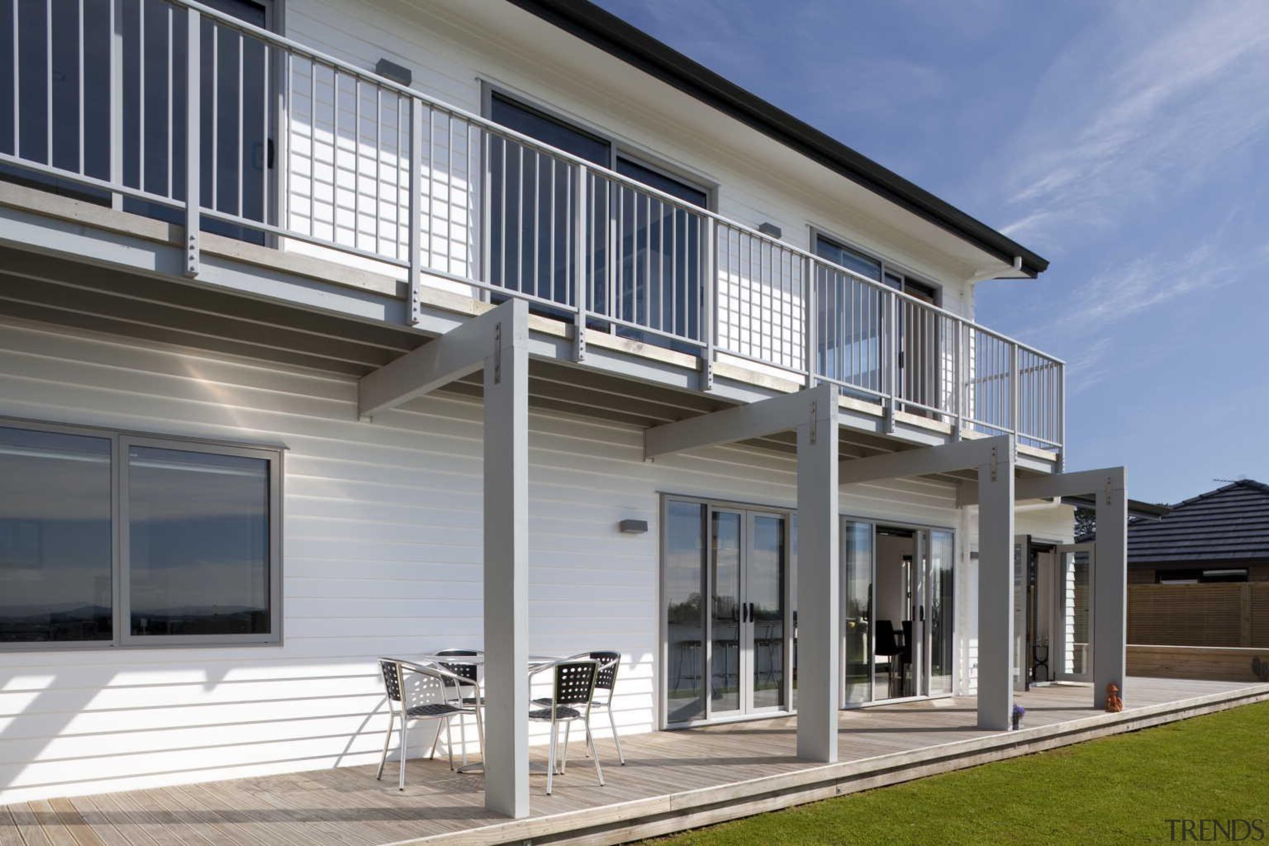 View of ground deck - Exterior - building building, daylighting, elevation, facade, home, house, property, real estate, residential area, siding, window, gray