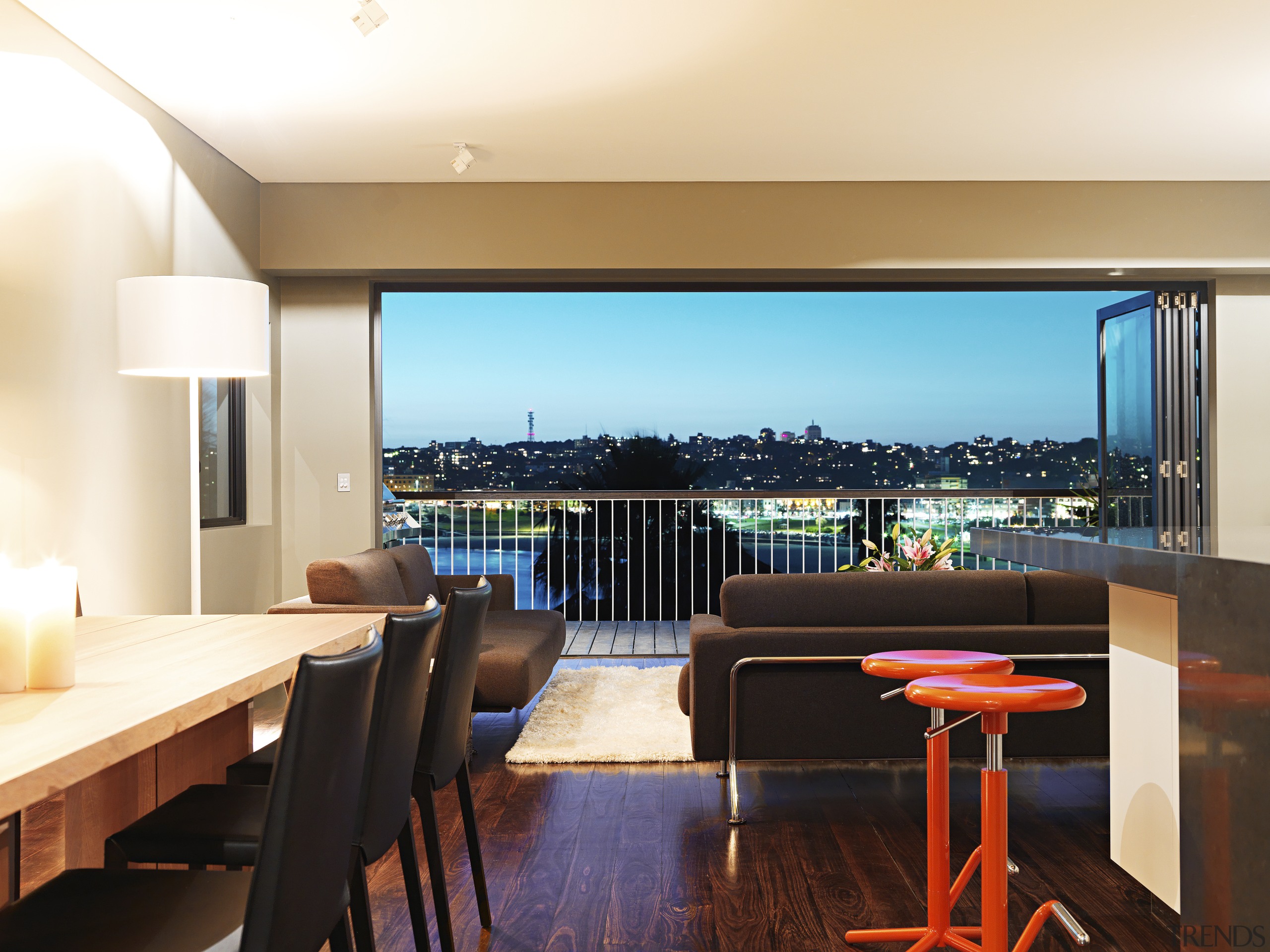 Views out to the city in this living interior design, real estate, room, suite, white