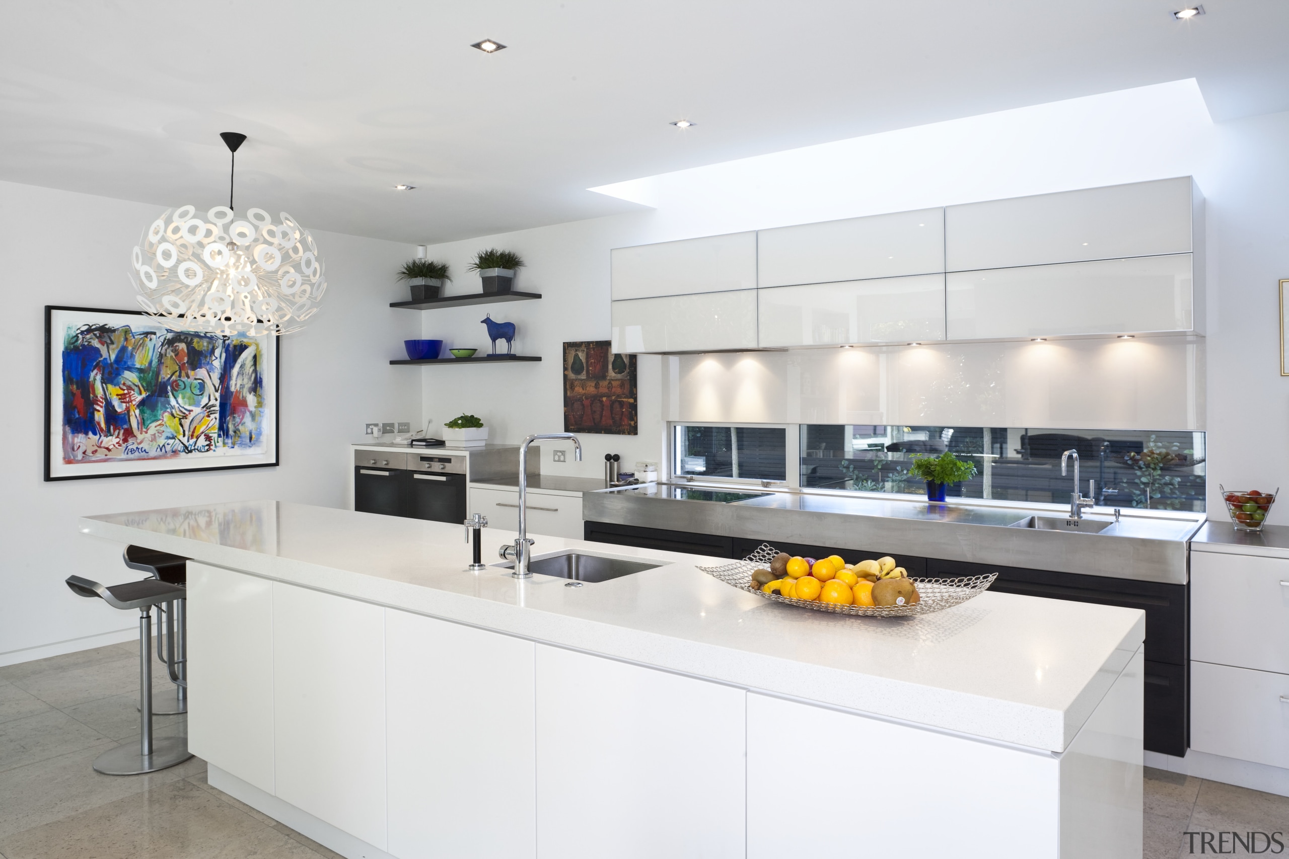 Modern kitchen features brilliant white panelling - Modern countertop, interior design, kitchen, real estate, white