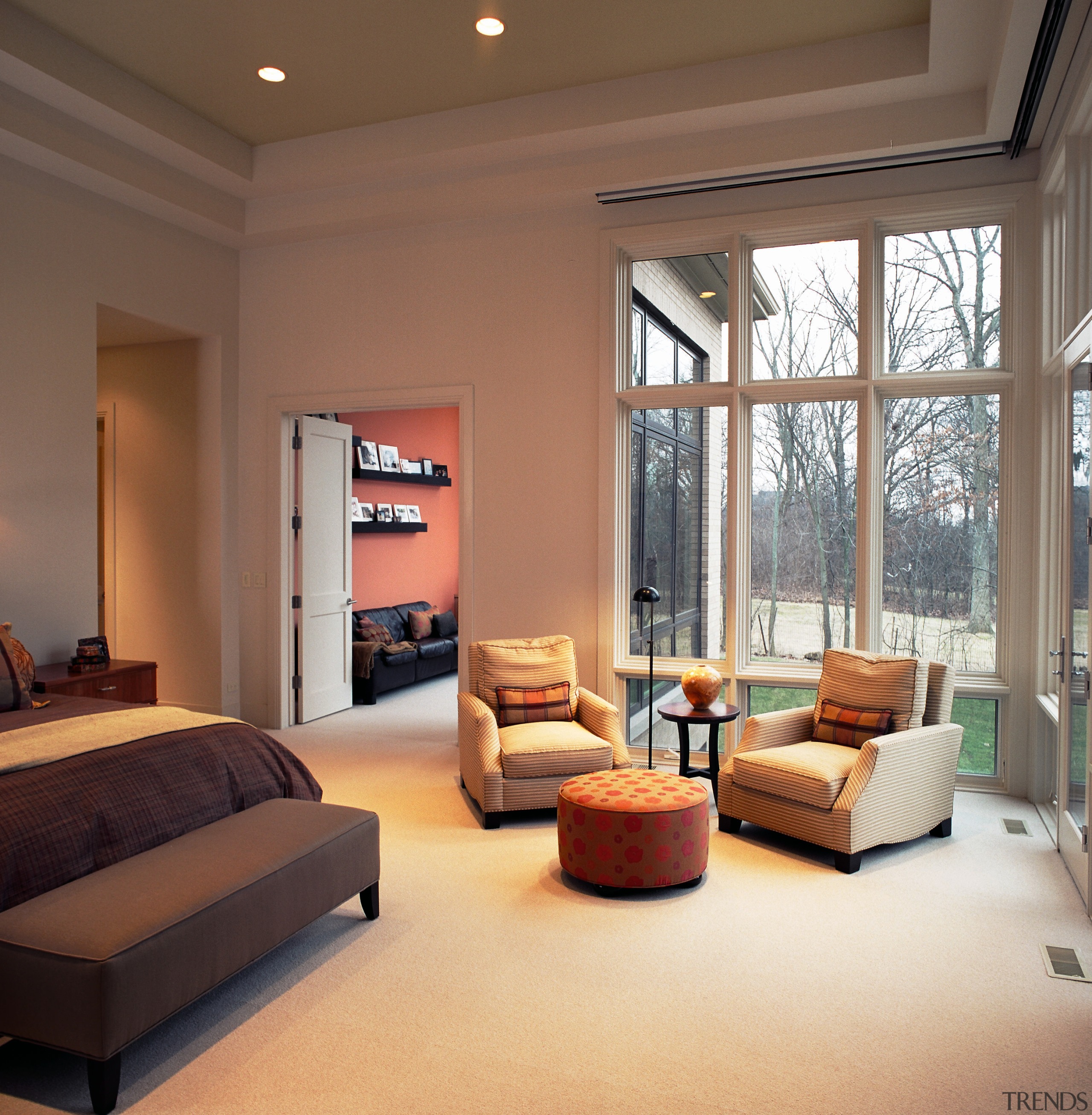 A view of the master bedroom. - A ceiling, estate, floor, home, interior design, living room, real estate, room, wall, window, brown