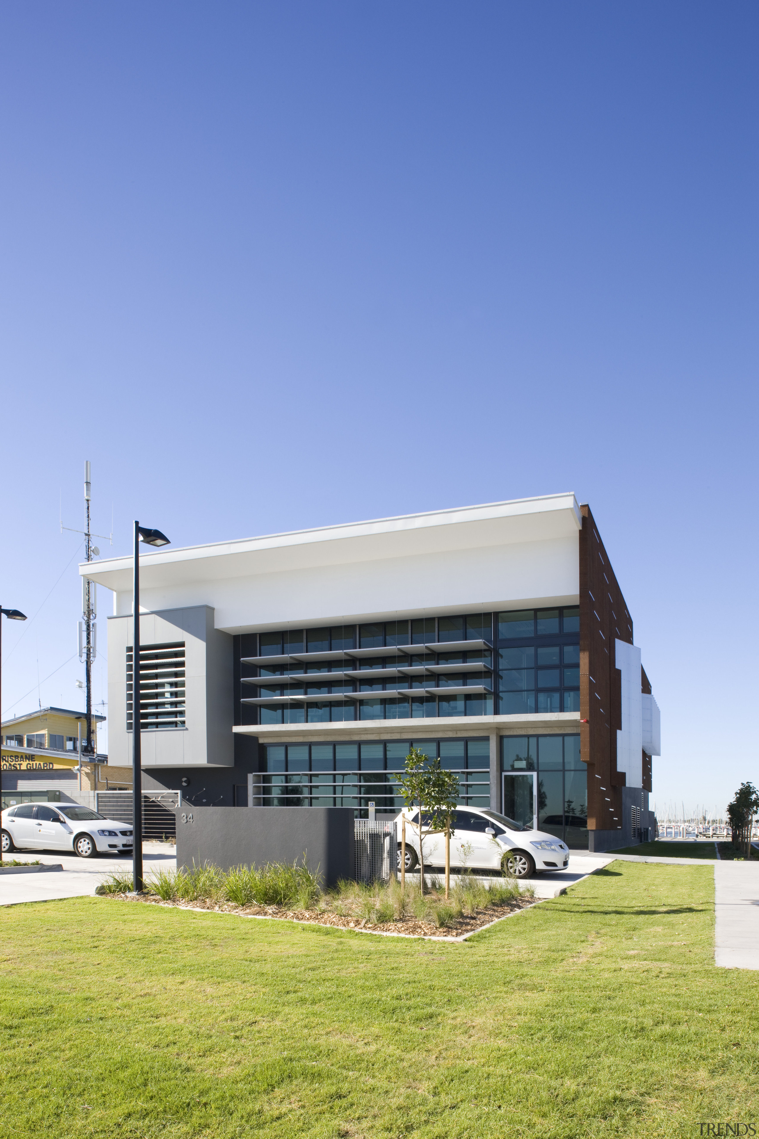 Exterior view of the sustainable Environmental Protection Agency architecture, building, commercial building, corporate headquarters, daytime, facade, headquarters, house, real estate, sky, teal