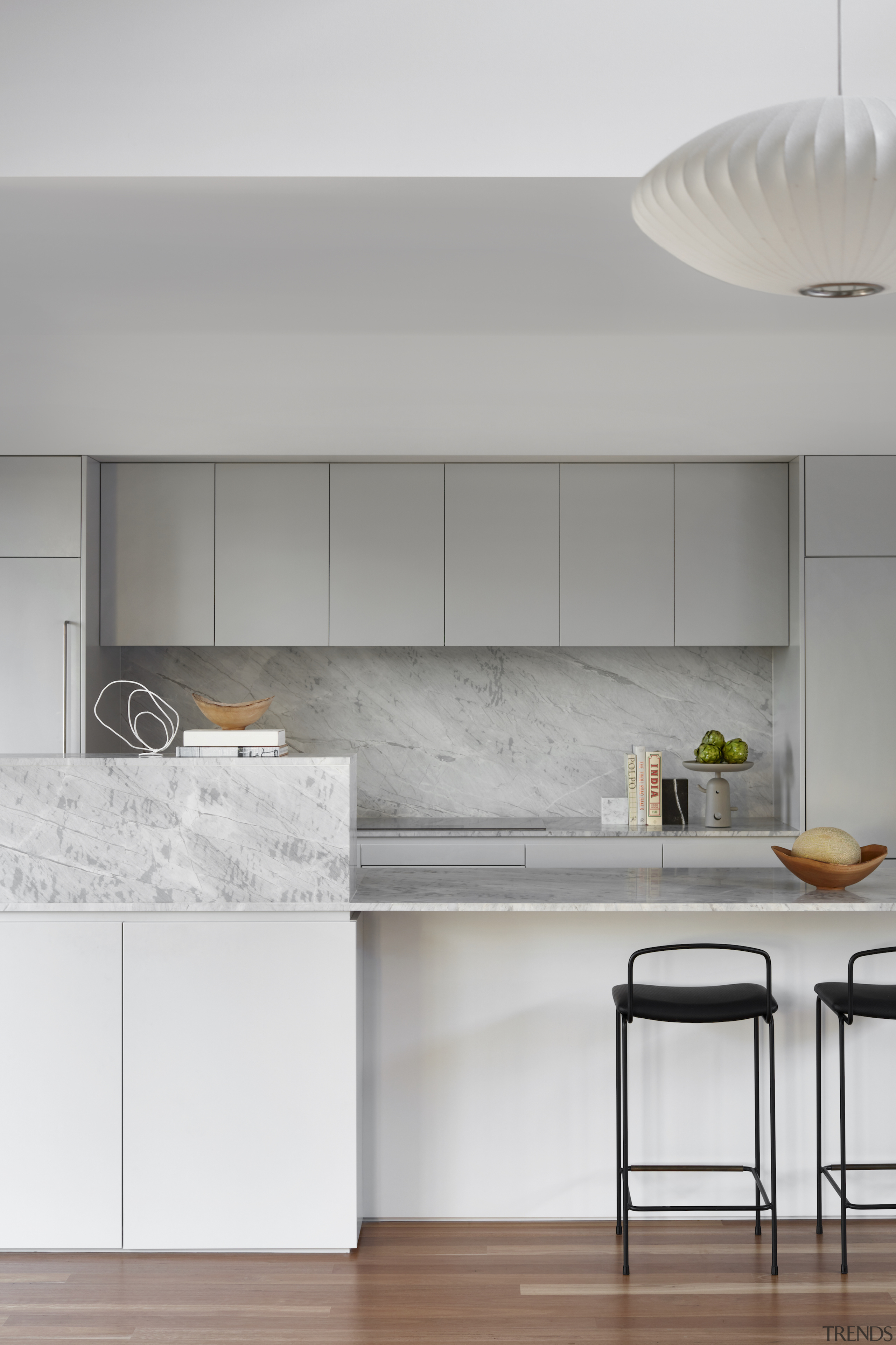 Marble benchtops complete the restrained yet opulent kitchen 