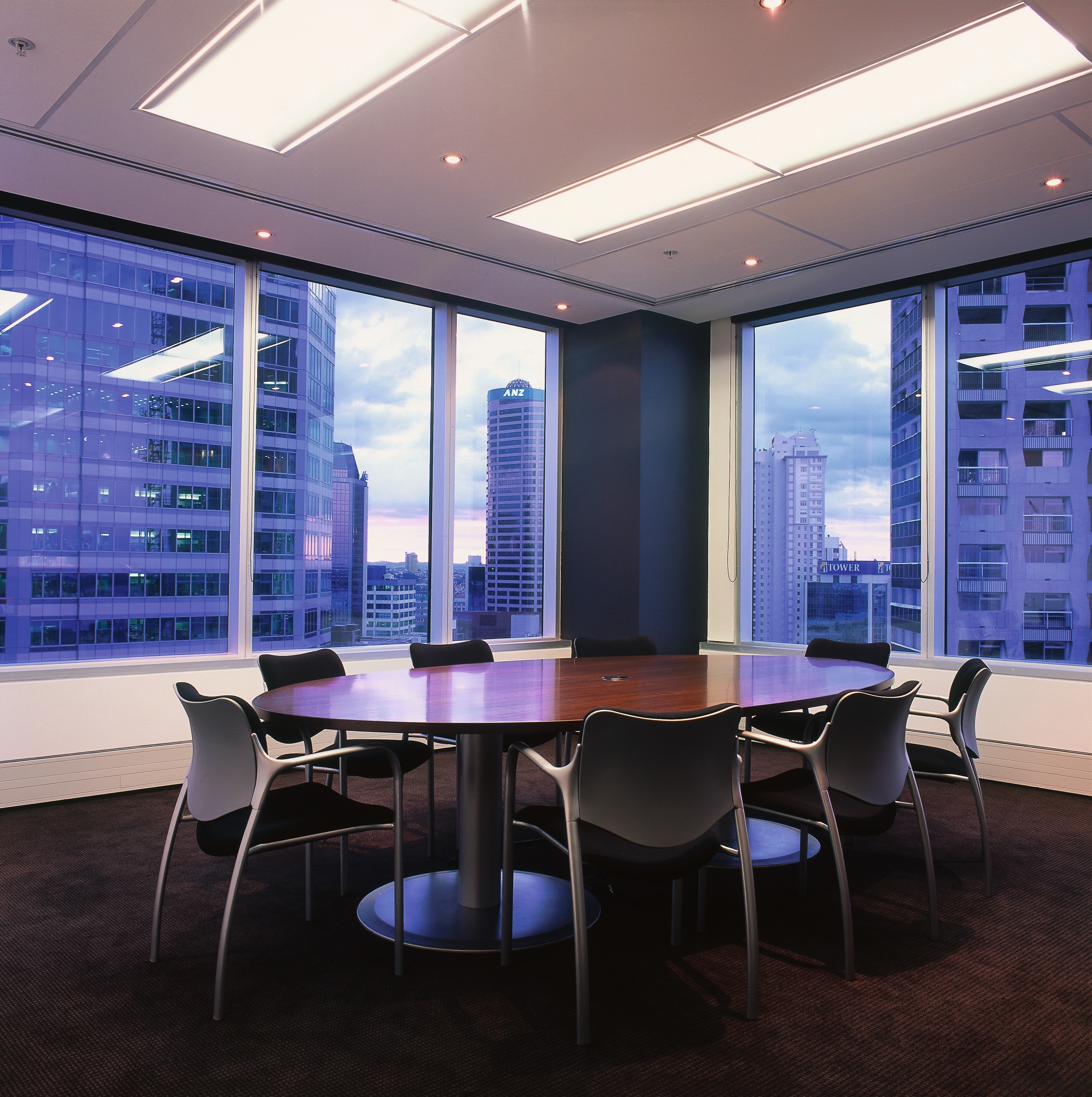 A view of various peices of office furniture. ceiling, conference hall, daylighting, furniture, interior design, lighting, office, table, black, blue