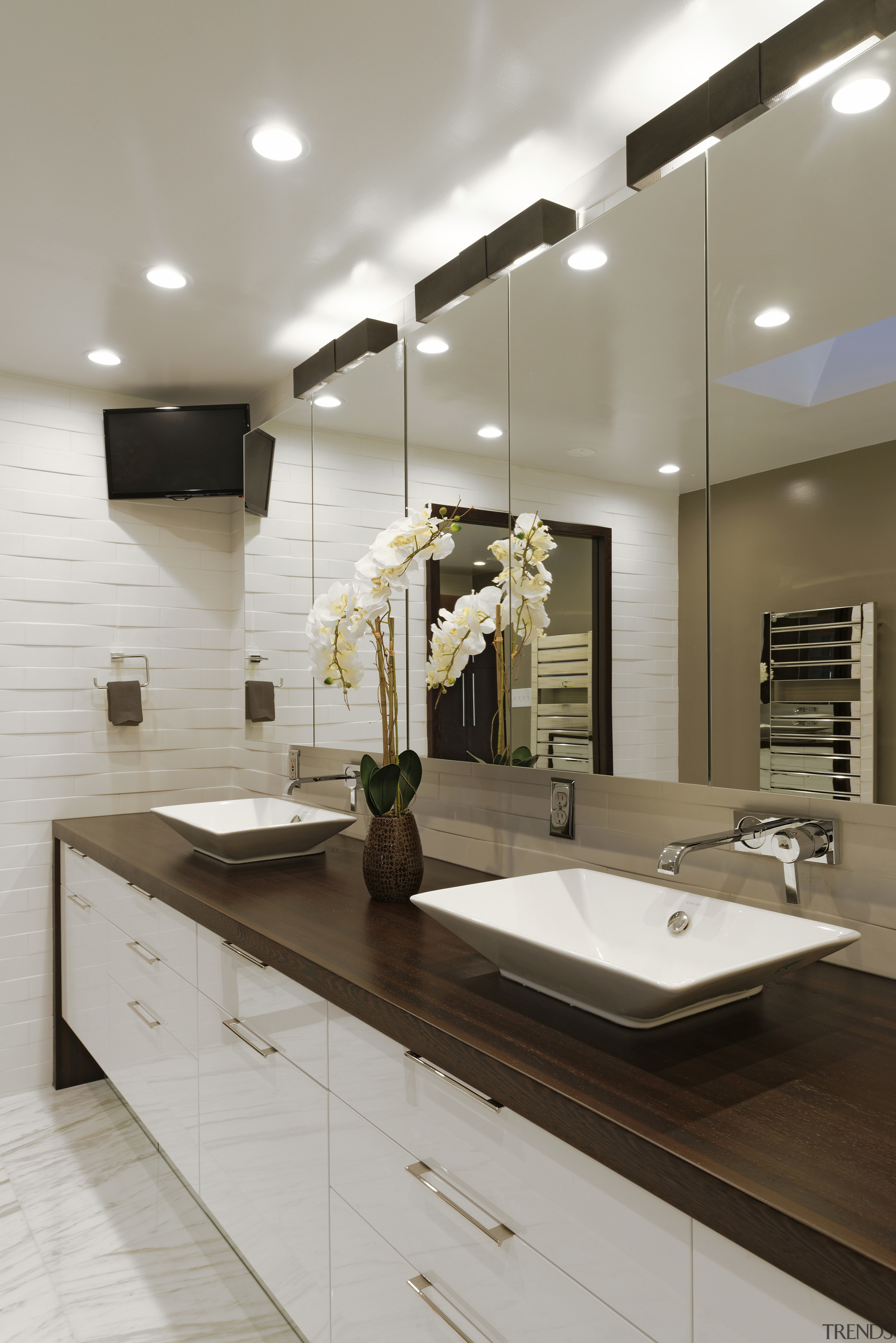 This bathroom features wenge countertops in a waterfall bathroom, ceiling, countertop, interior design, kitchen, room, sink, tap, gray, brown