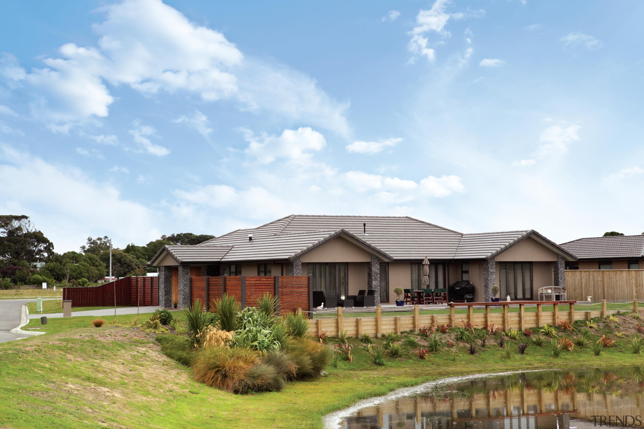 Presenting Austral Bricks® Designa Schist - an innovative cottage, estate, facade, farmhouse, home, house, land lot, landscape, property, real estate, residential area, roof, sky, suburb, white