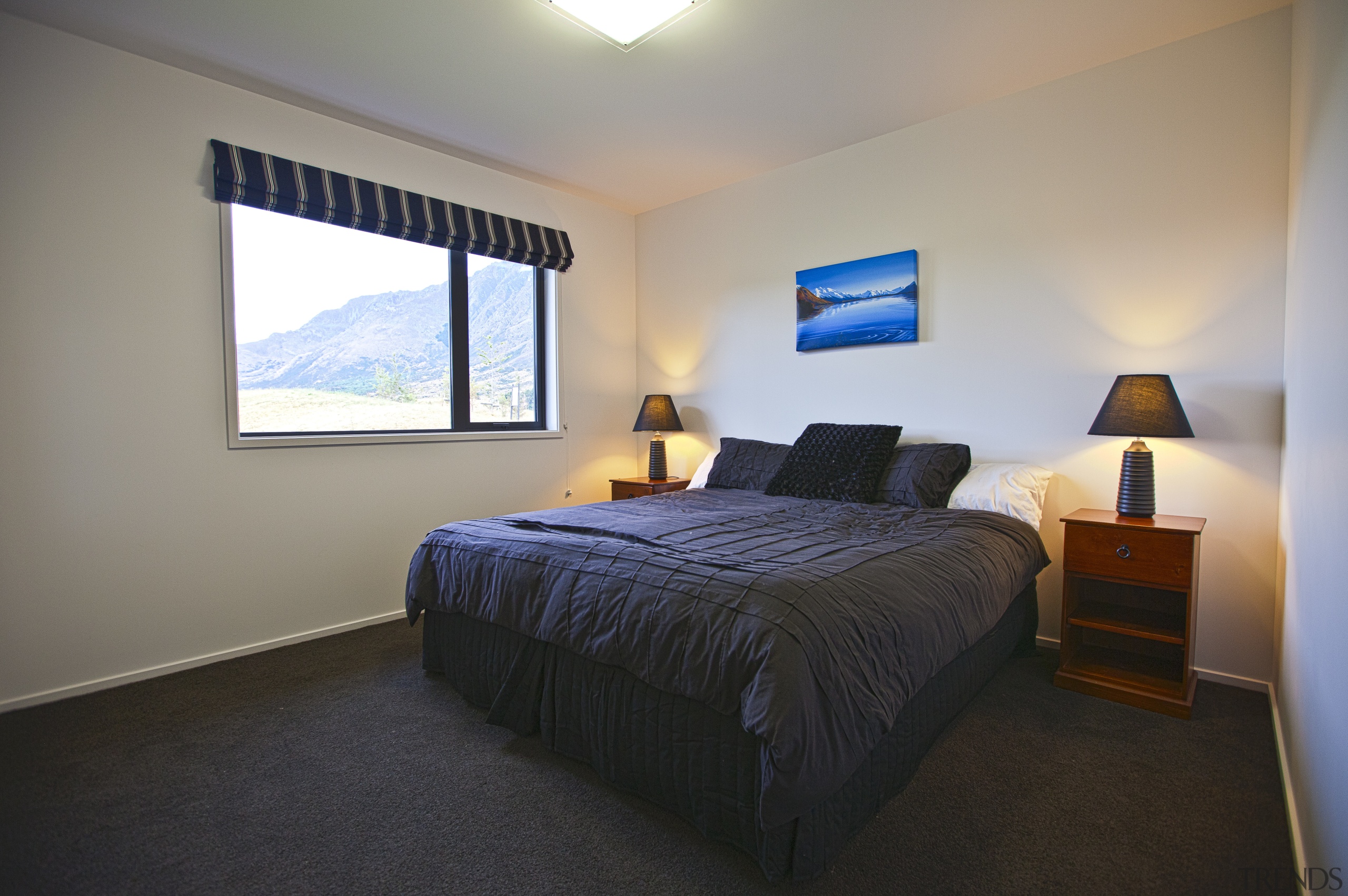 Bedroom with light walls, dark grey bedspread and bedroom, ceiling, home, interior design, real estate, room, gray, black