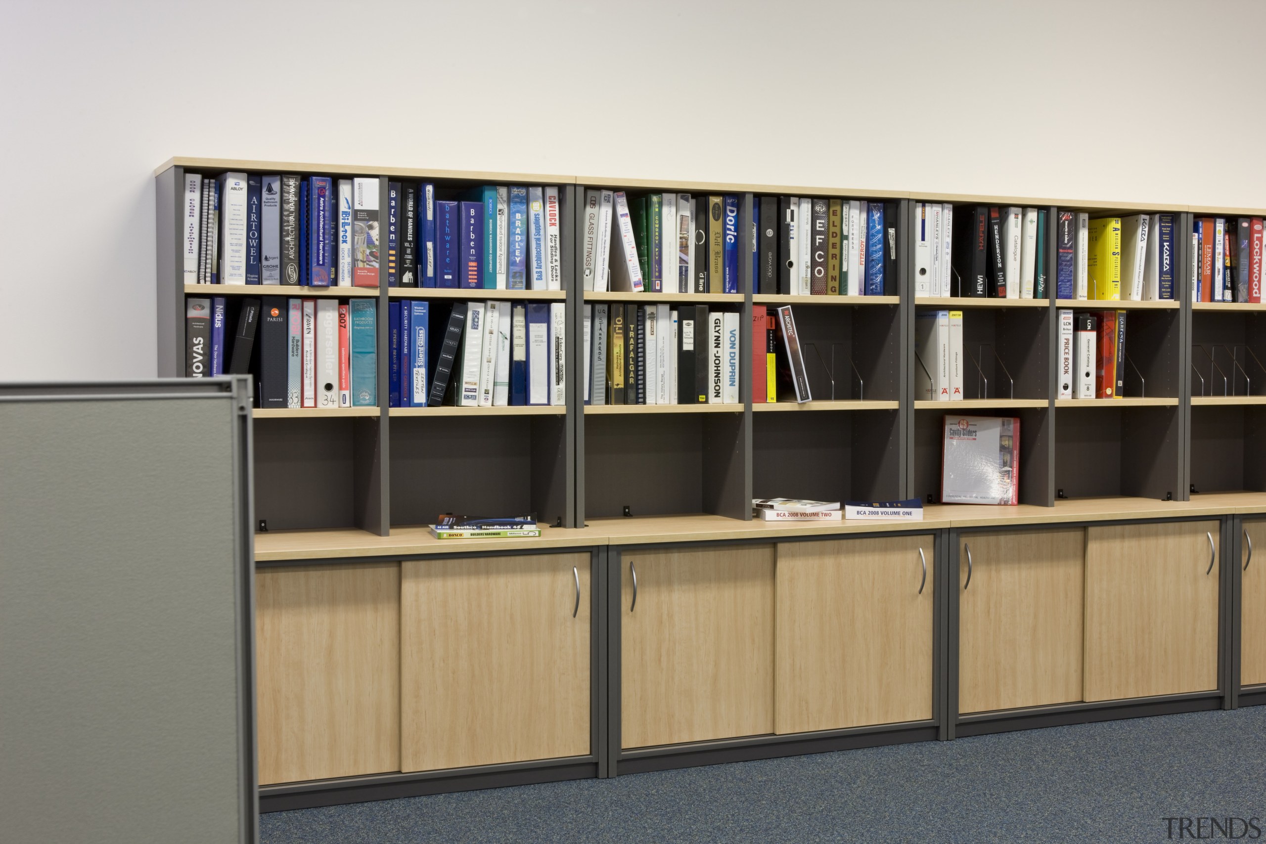 Image of desk and shelving supplied by The bookcase, furniture, institution, library, library science, product design, public library, shelf, shelving, white