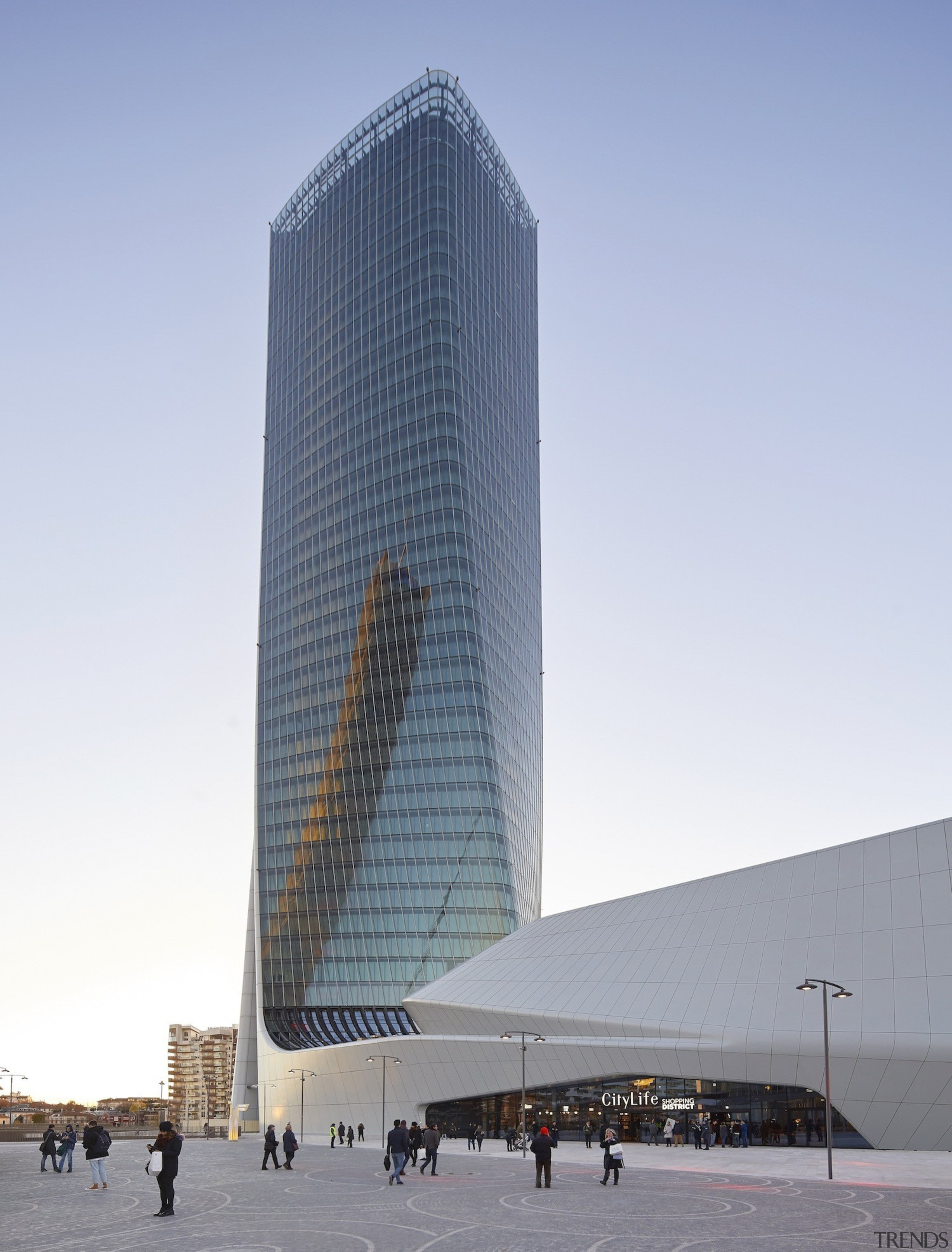 The tower twists around as it rises up architecture, building, commercial building, corporate headquarters, daytime, headquarters, metropolis, metropolitan area, sky, skyscraper, tower, tower block, white