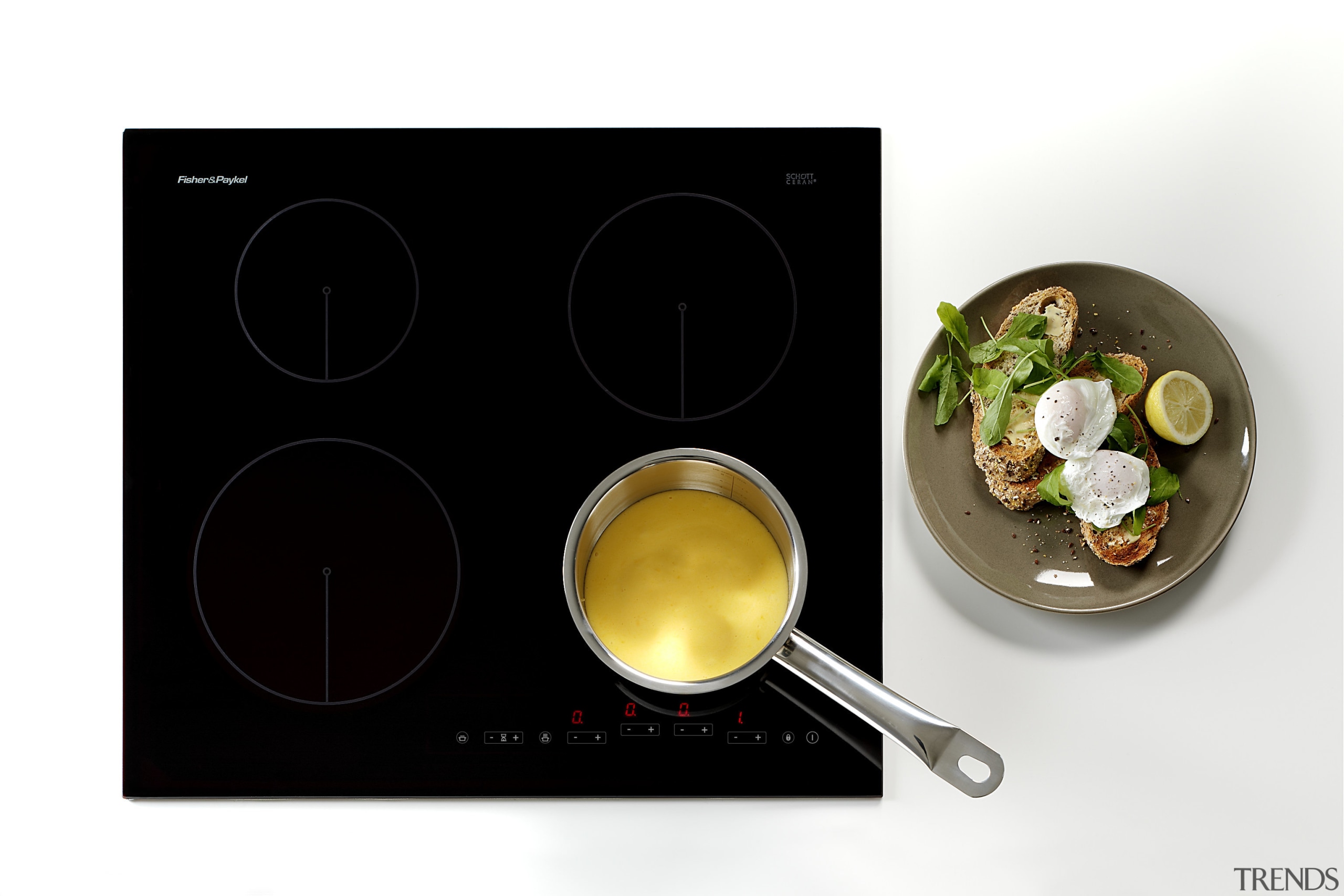 View of ceramic cooktops from Fisher &amp; Paykel. cookware and bakeware, product design, tableware, white, black