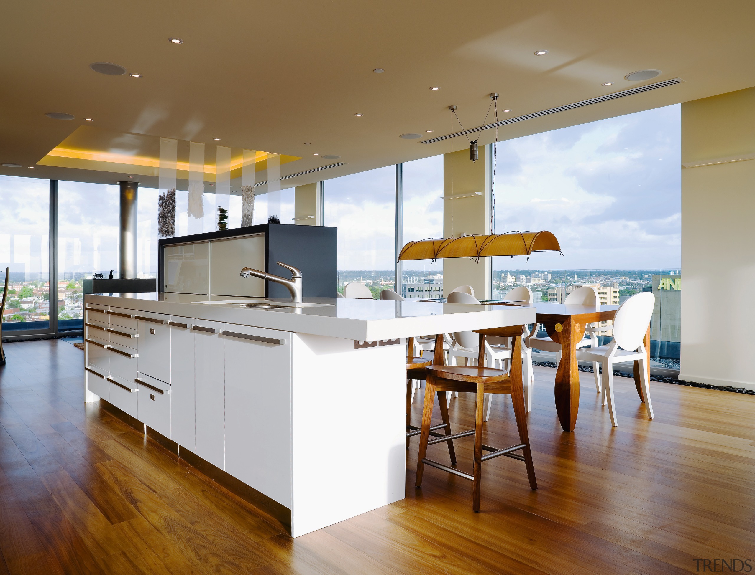 Minimalist, but not sterile, the kitchen allows the architecture, countertop, floor, flooring, hardwood, house, interior design, kitchen, real estate, wood flooring, brown, white
