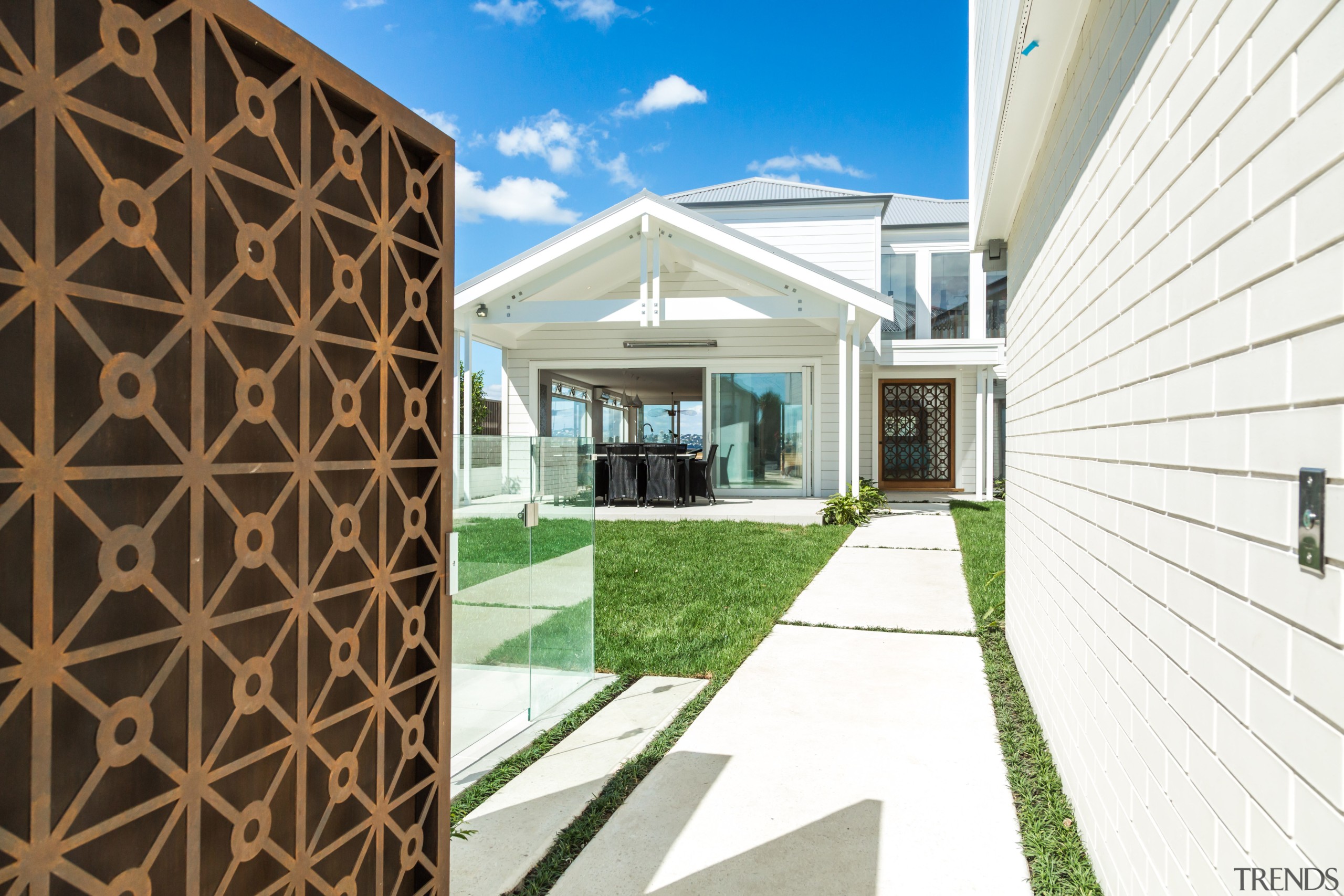 Metal gate and weatherboard walls on Devonport renovation architecture, building, estate, facade, home, house, property, real estate, white