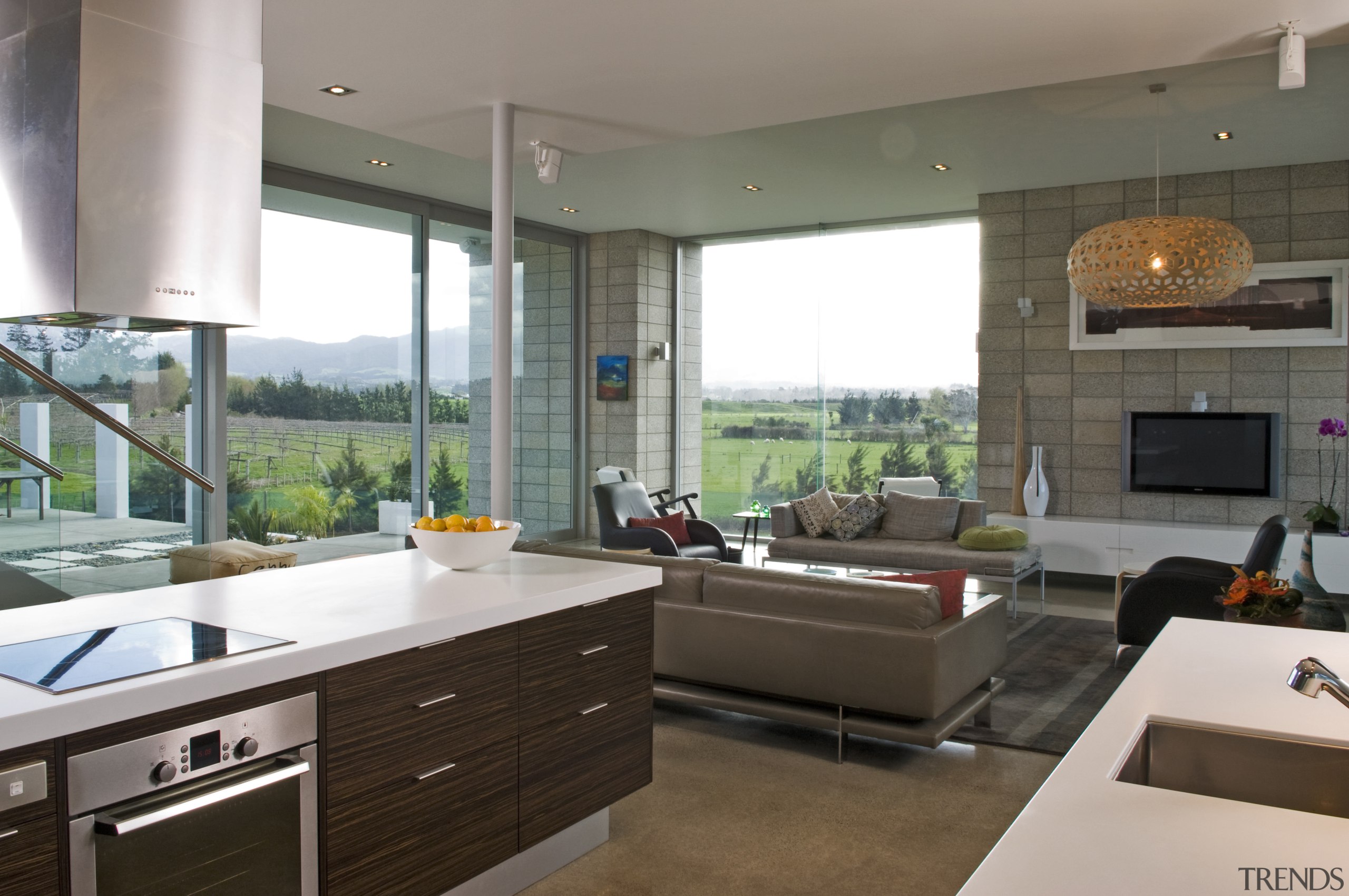 View of a kitchen designed by Celia Visser countertop, interior design, kitchen, living room, real estate, window, gray