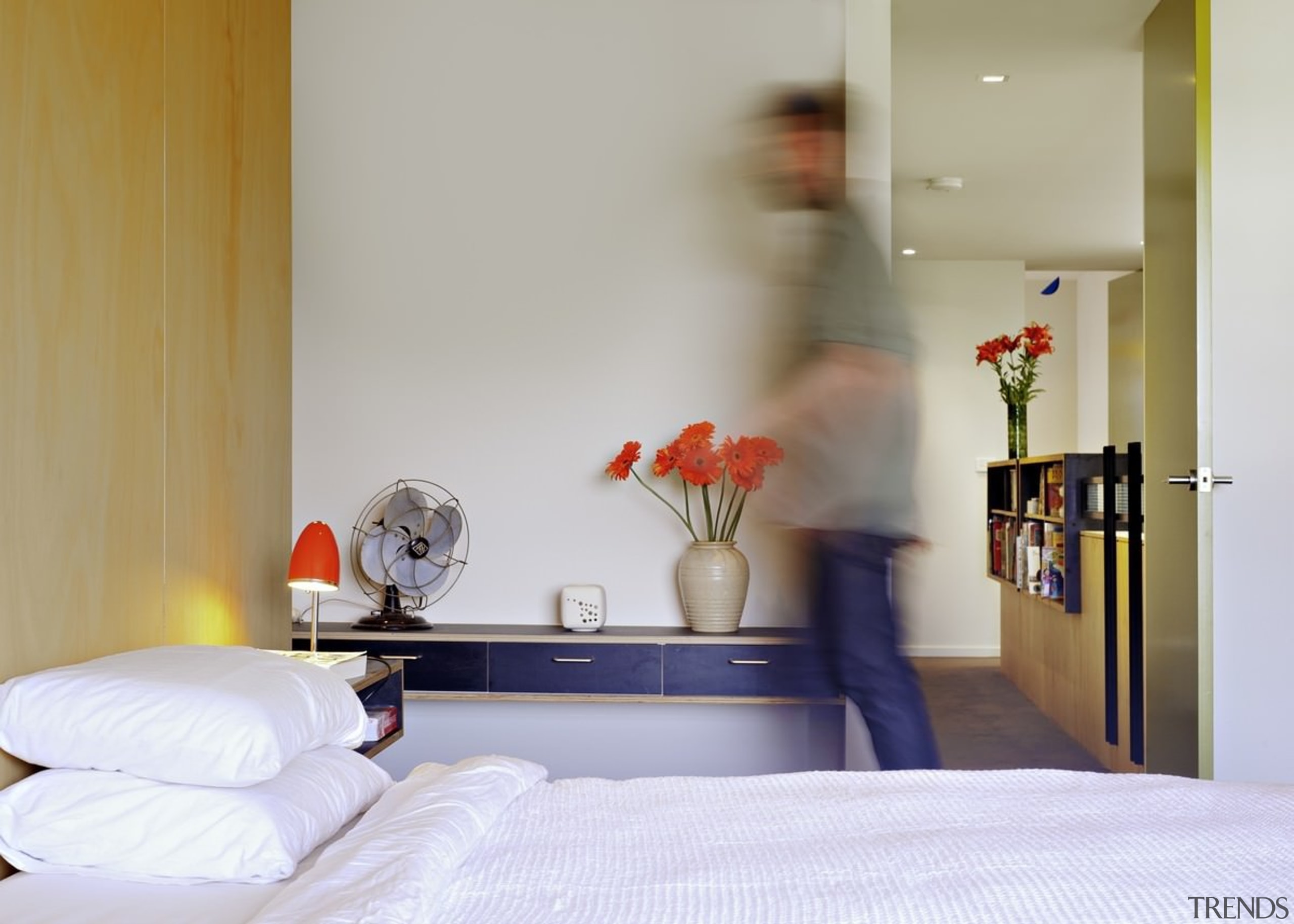 This bedroom features floating end tables - This bed, bedroom, furniture, home, interior design, room, suite, gray, white