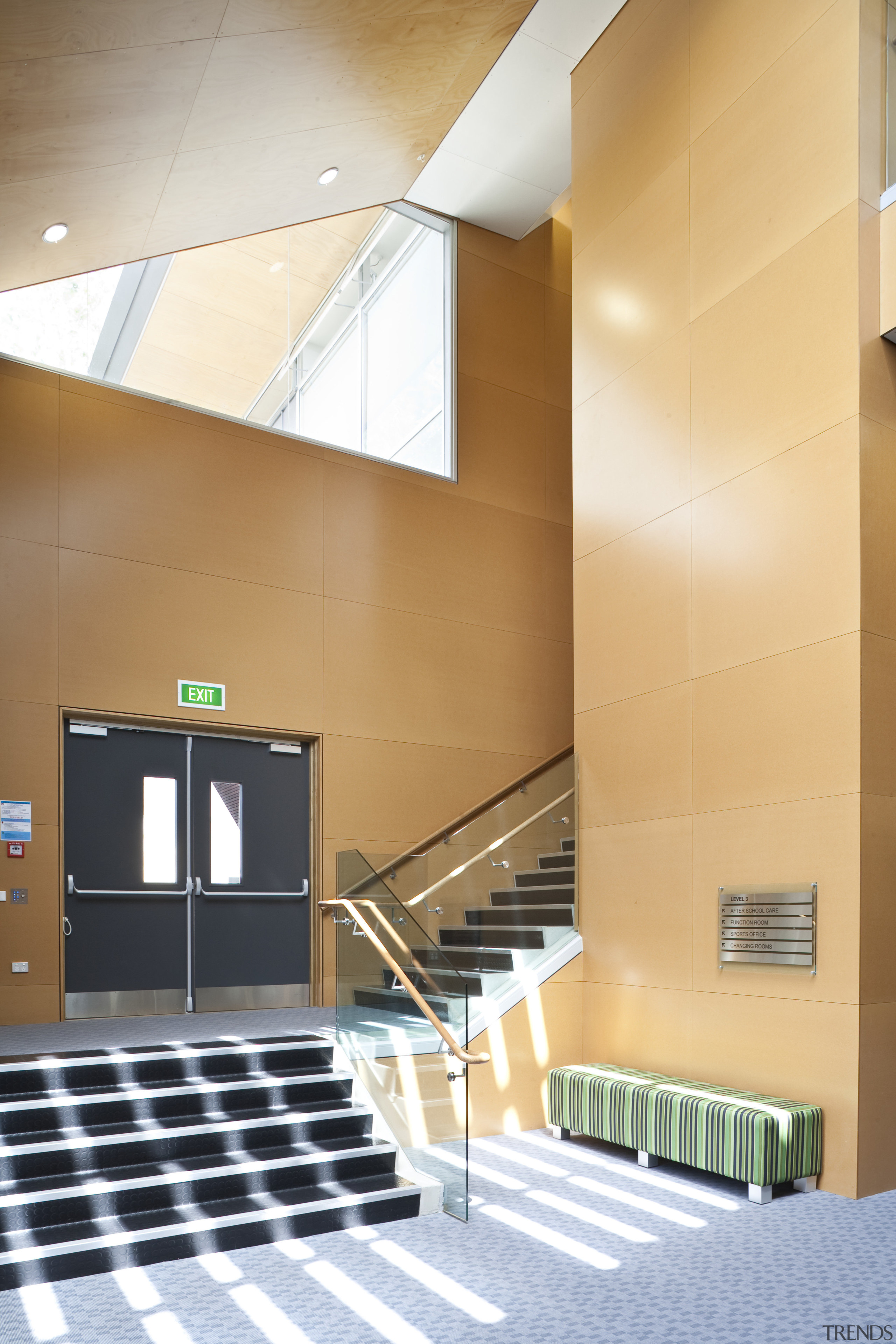 View of a stairway inside the St Kents' architecture, ceiling, daylighting, floor, flooring, glass, handrail, house, interior design, lobby, loft, stairs, wall, orange