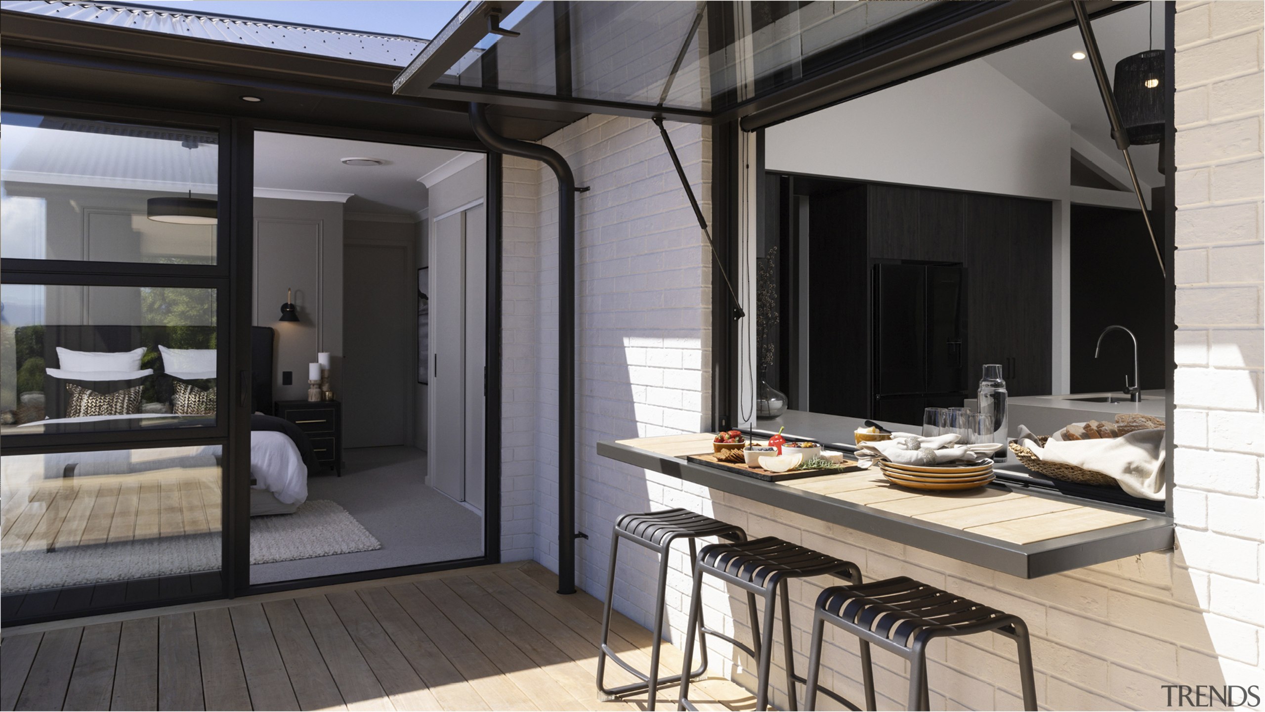 The deck is accessed by the entertainer's room, 