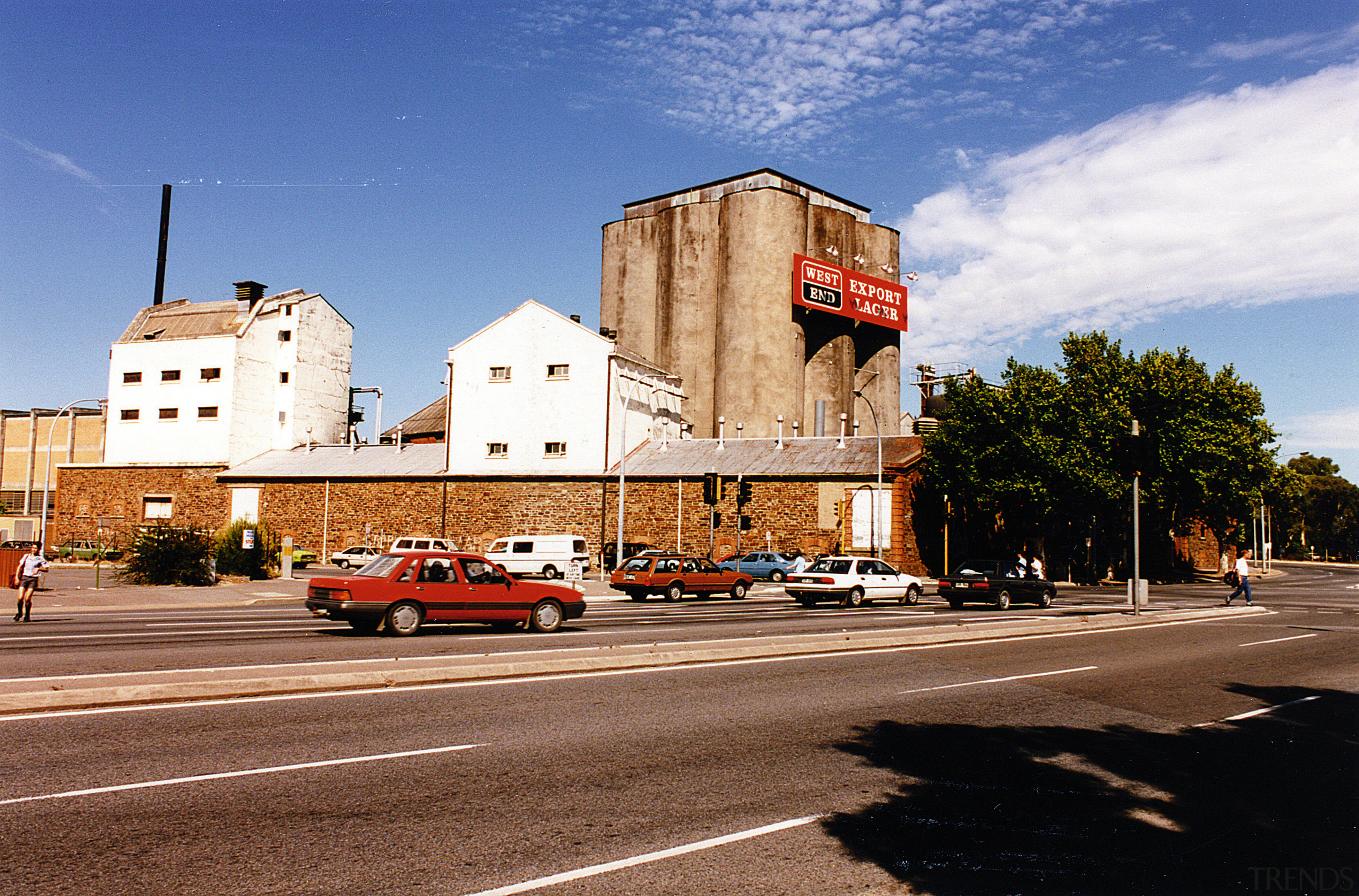 View of brewery complex before restoration into apartment architecture, building, car, city, downtown, facade, infrastructure, landmark, metropolitan area, neighbourhood, real estate, residential area, road, sky, street, suburb, town, urban area