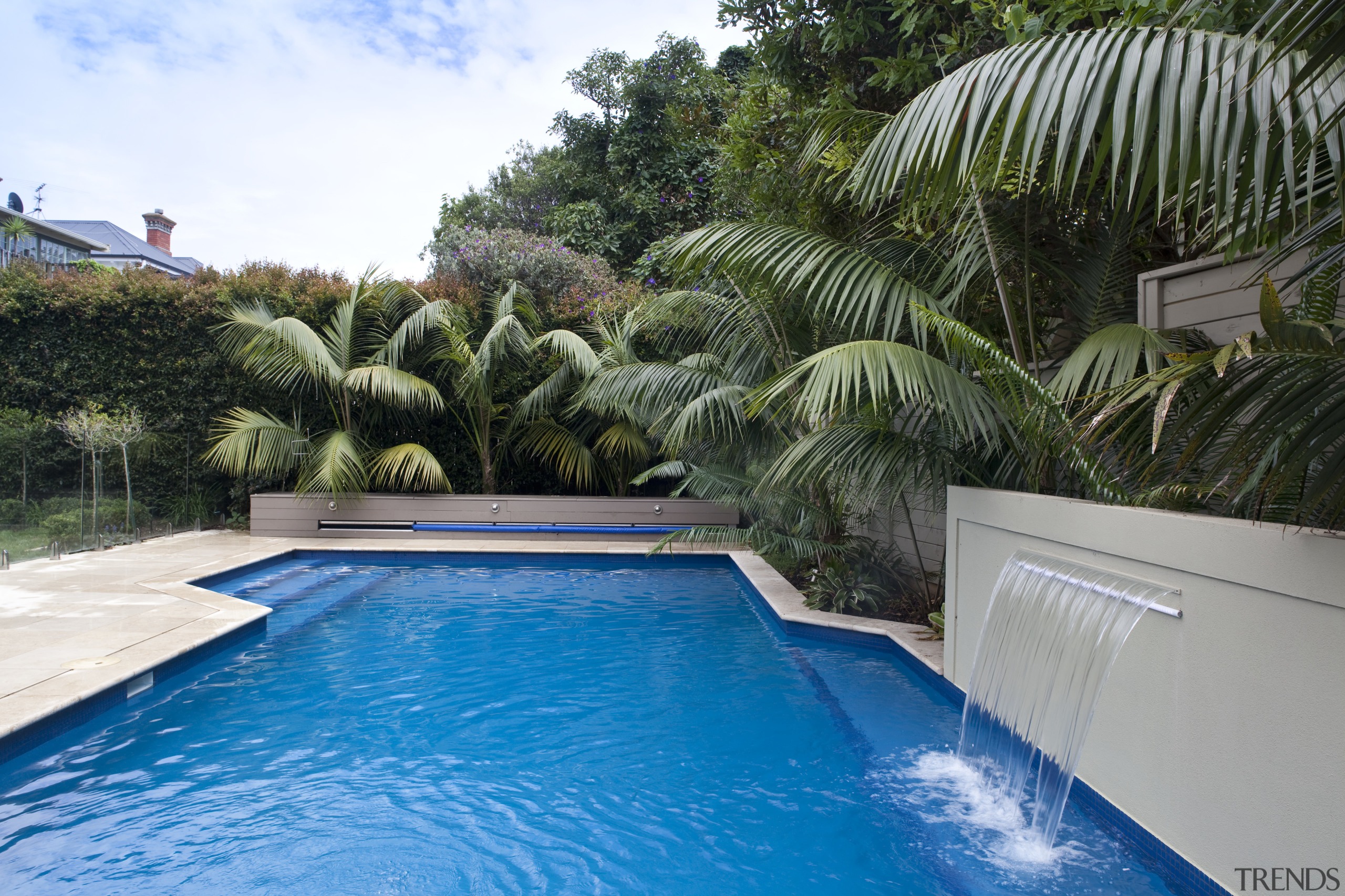 View of outdoor area with pool, paving, fountain, arecales, estate, house, leisure, palm tree, plant, property, real estate, resort, swimming pool, tree, water