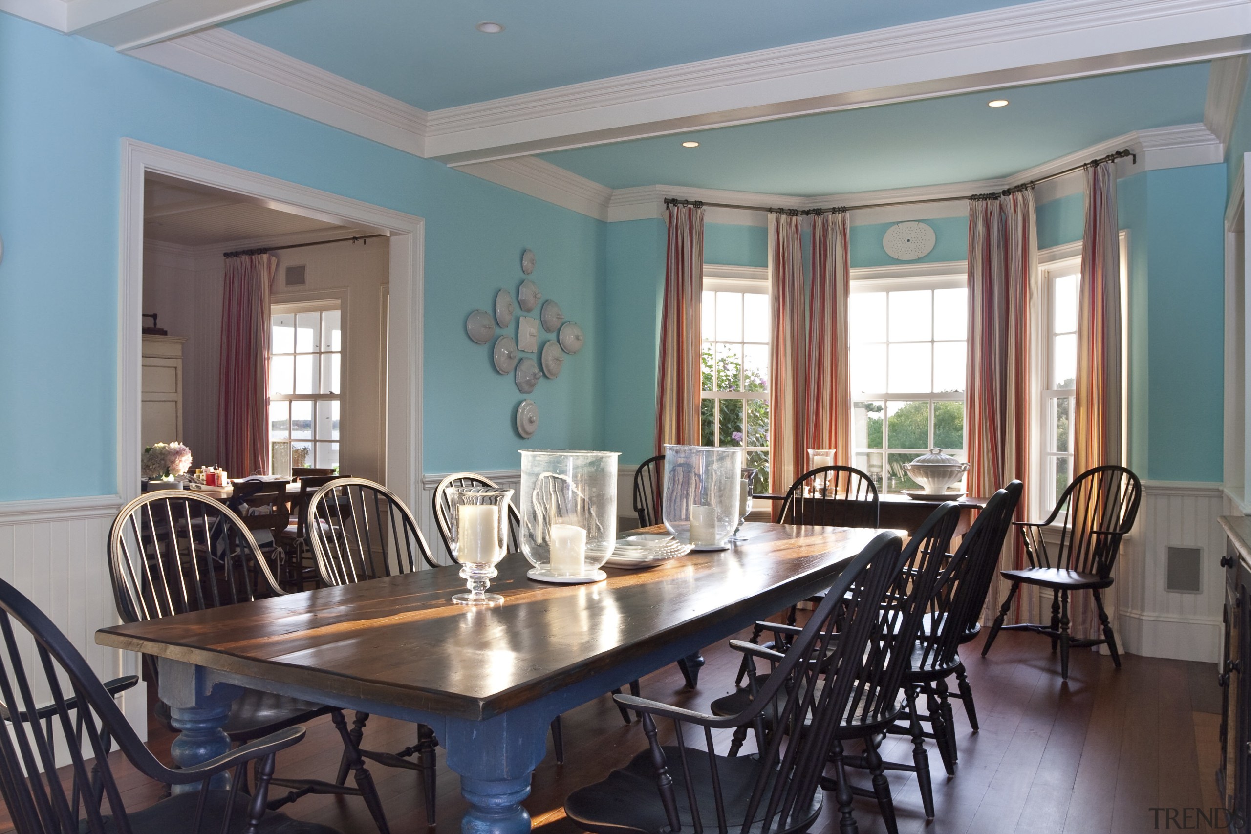 View of dining area featuring wooden floors and ceiling, dining room, estate, home, interior design, property, real estate, room, table, window, gray